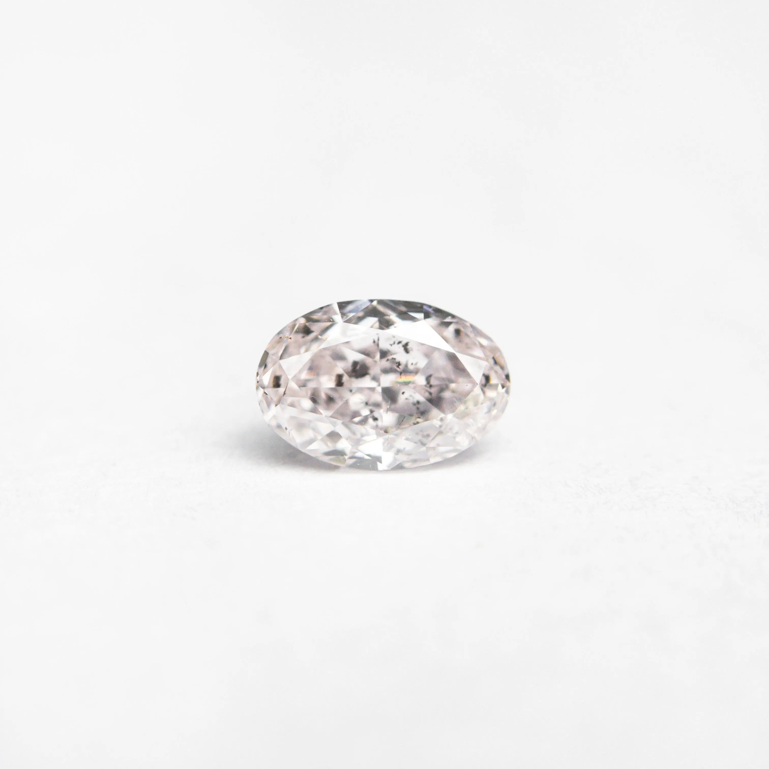 0.40ct 5.38x3.60x2.59mm GIA I1 Fancy Light Pink Oval Brilliant 24094-01