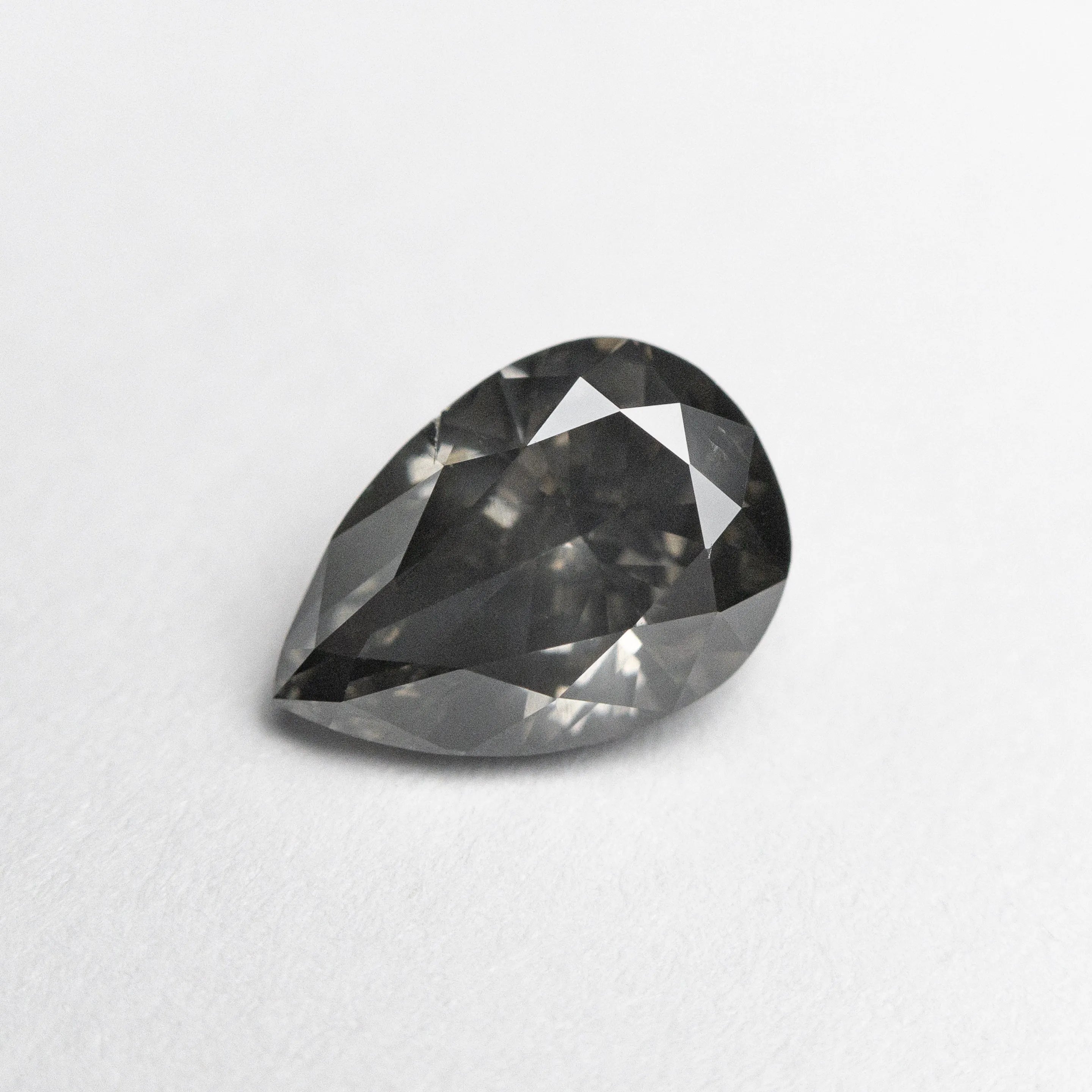 1.01ct 7.83x5.42x3.38mm Fancy Dark Grey Pear Brilliant 19913-01
