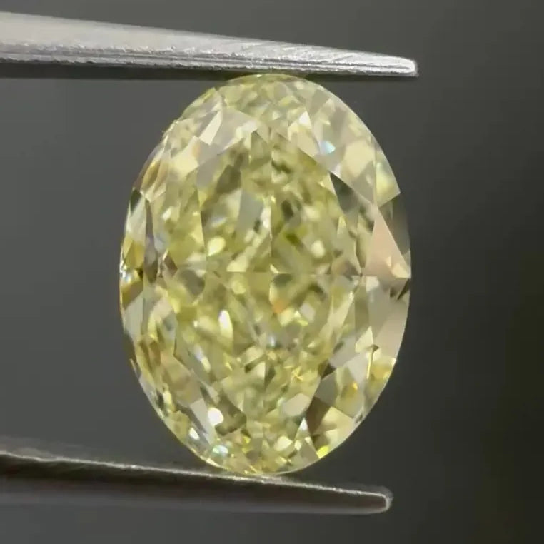 2.10ct Oval Natural Diamond (Colour Fancy Light Yellow, Clarity VVS1, Cut GD, GIA Certified)