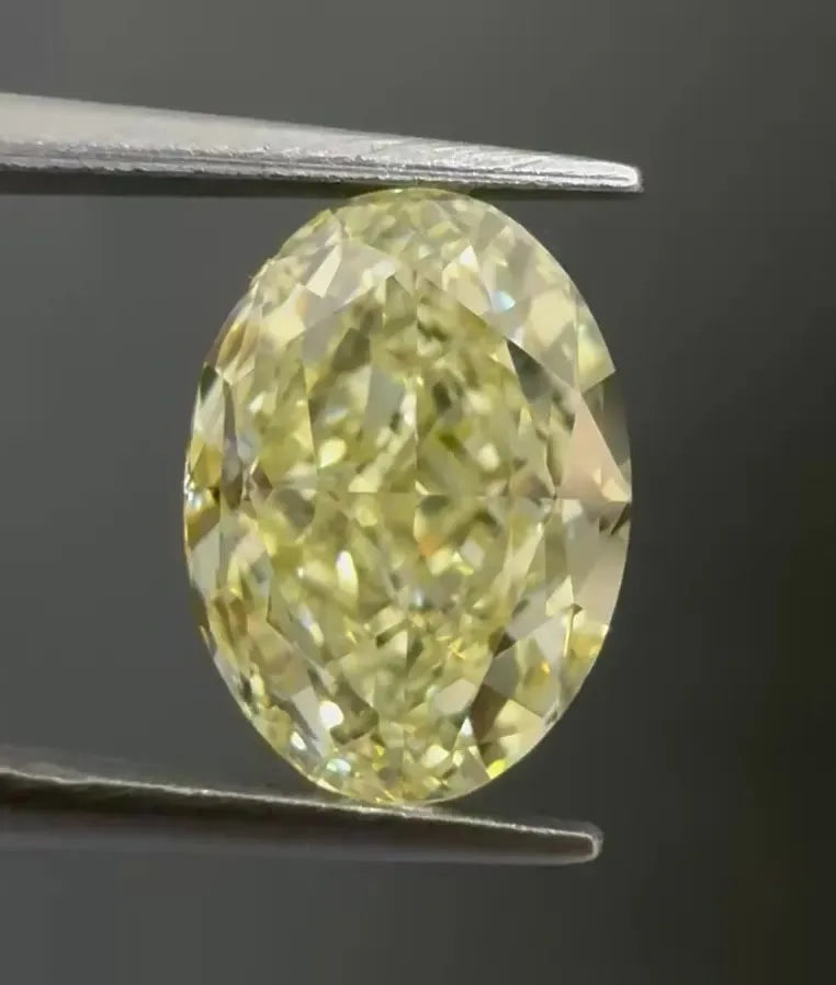 2.10ct Oval Natural Diamond (Colour Fancy Light Yellow, Clarity VVS1, Cut GD, GIA Certified)