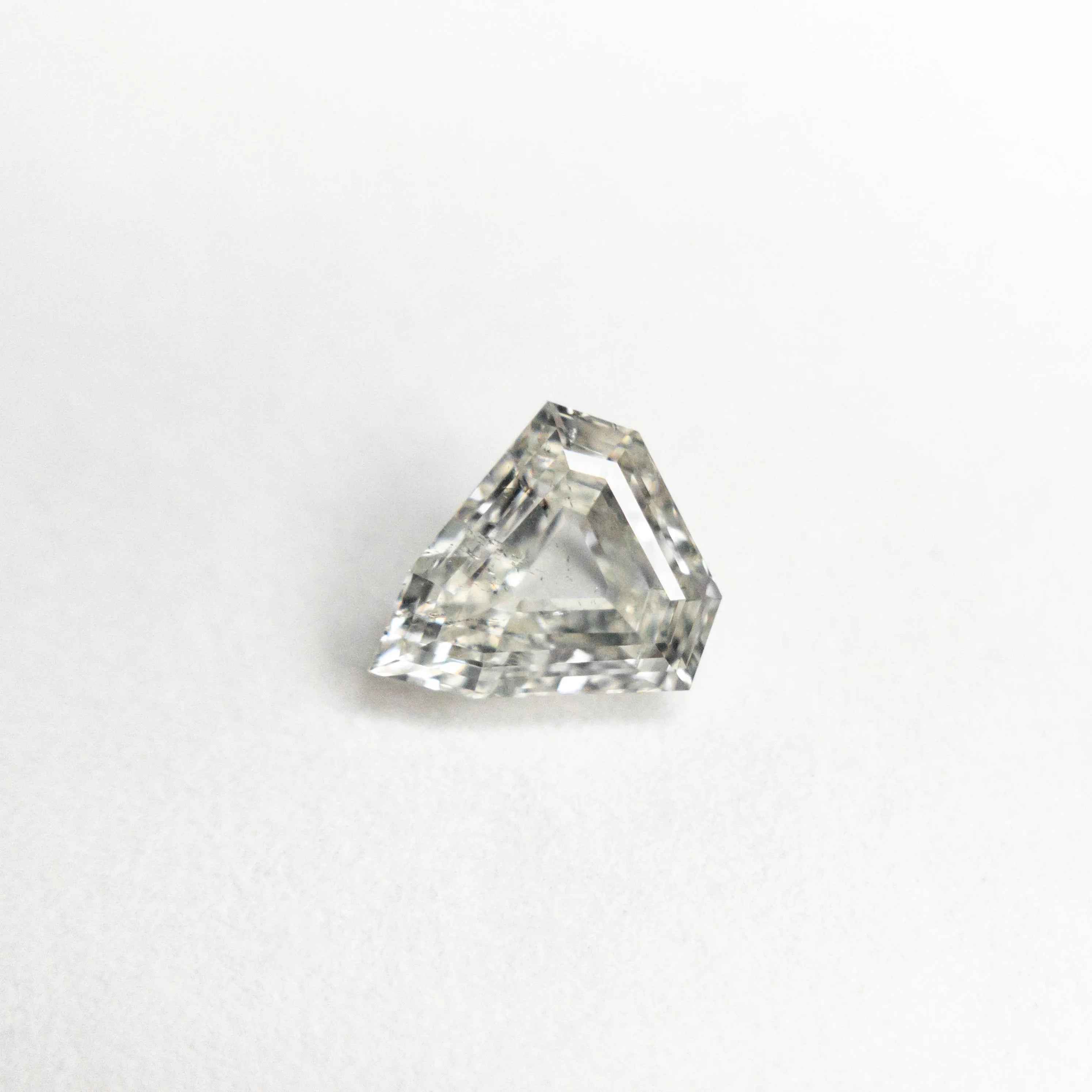 0.52ct 5.80x5.37x2.35mm I1 J Shield Step Cut 🇨🇦 21488-01