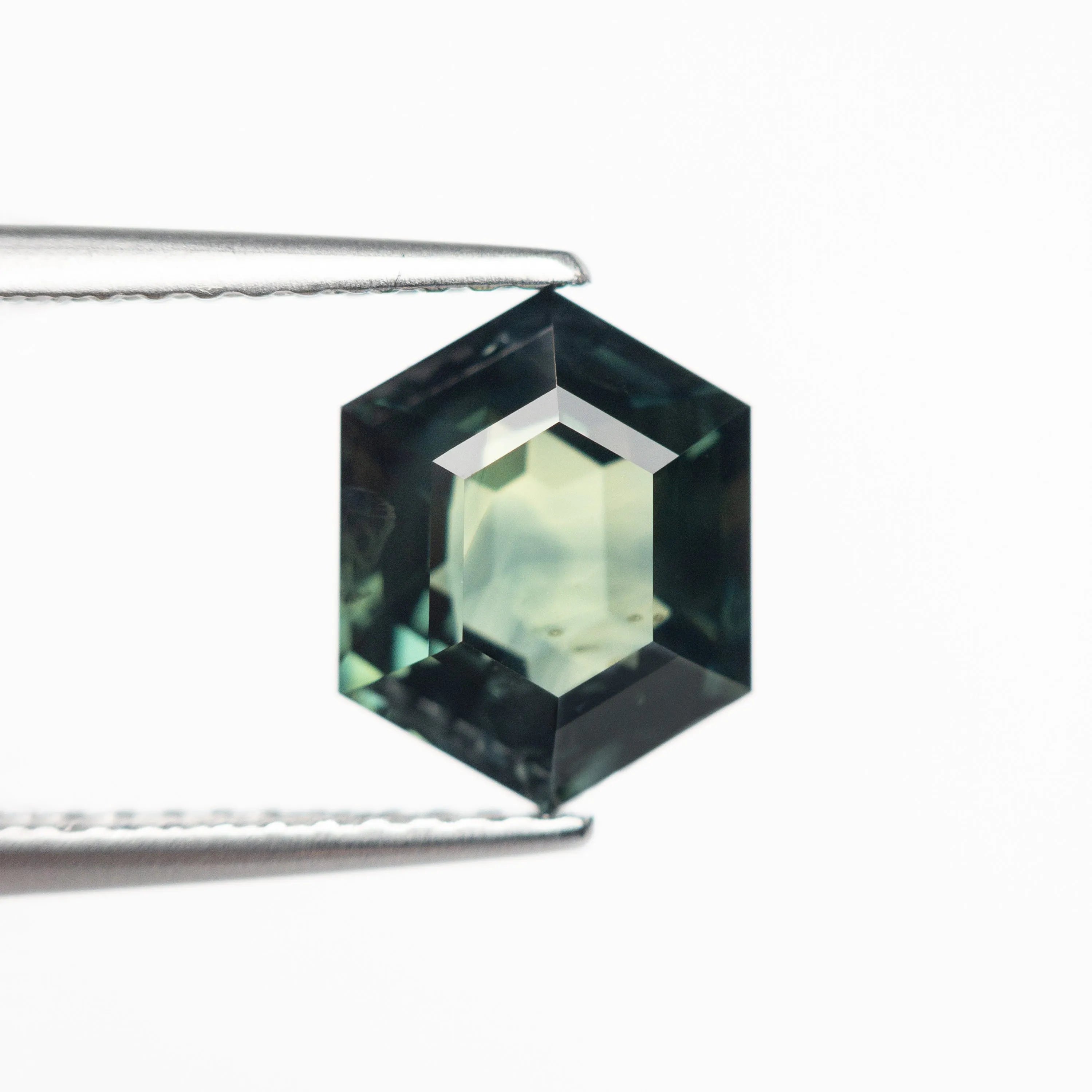 3.04ct 9.36x7.45x5.19mm Hexagon Step Cut Sapphire 22765-01
