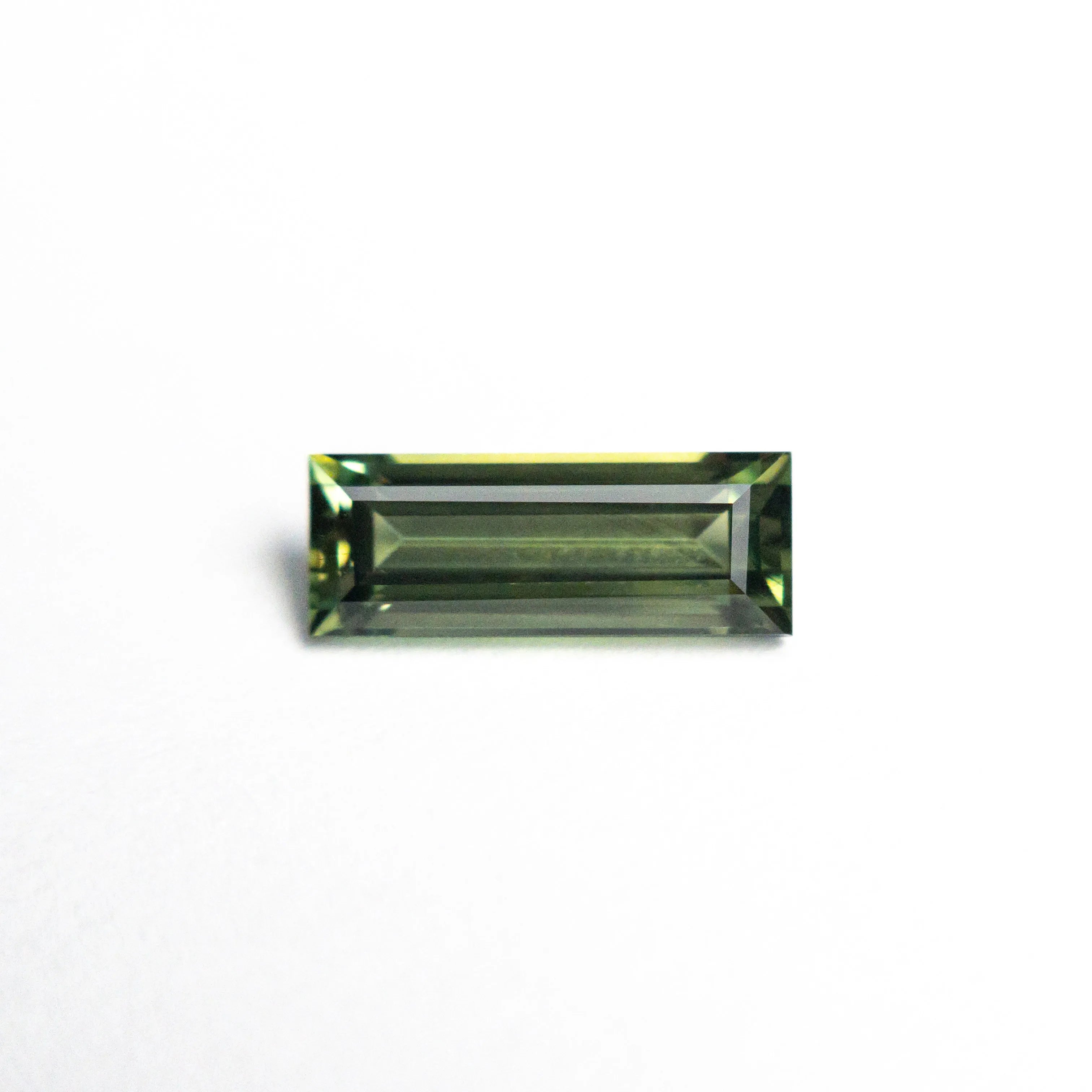 0.85ct 8.45x3.22x2.61mm Rectangle Step Cut Sapphire 25740-03