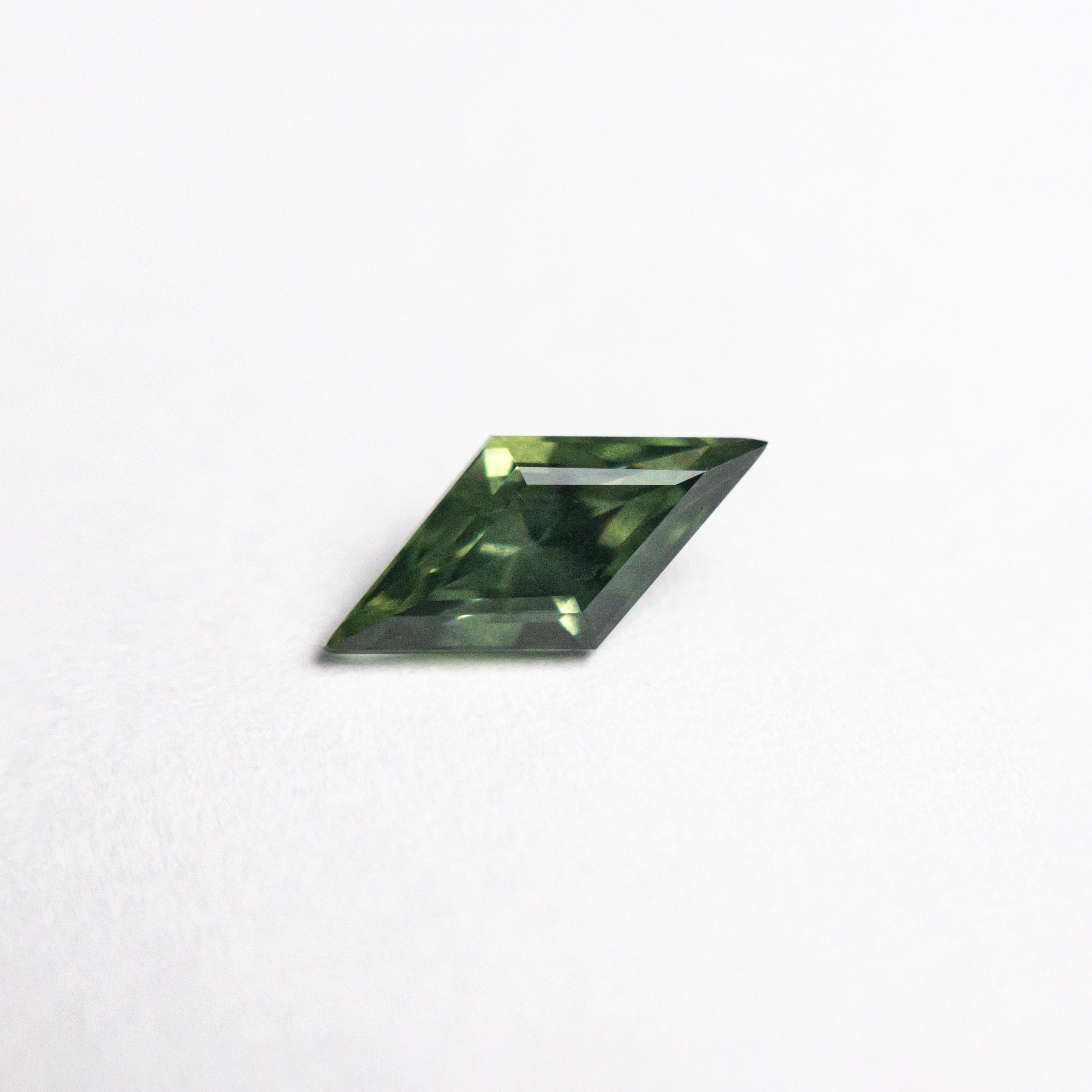 0.62ct 8.76x4.28x3.13mm Lozenge Step Cut Sapphire 25740-04