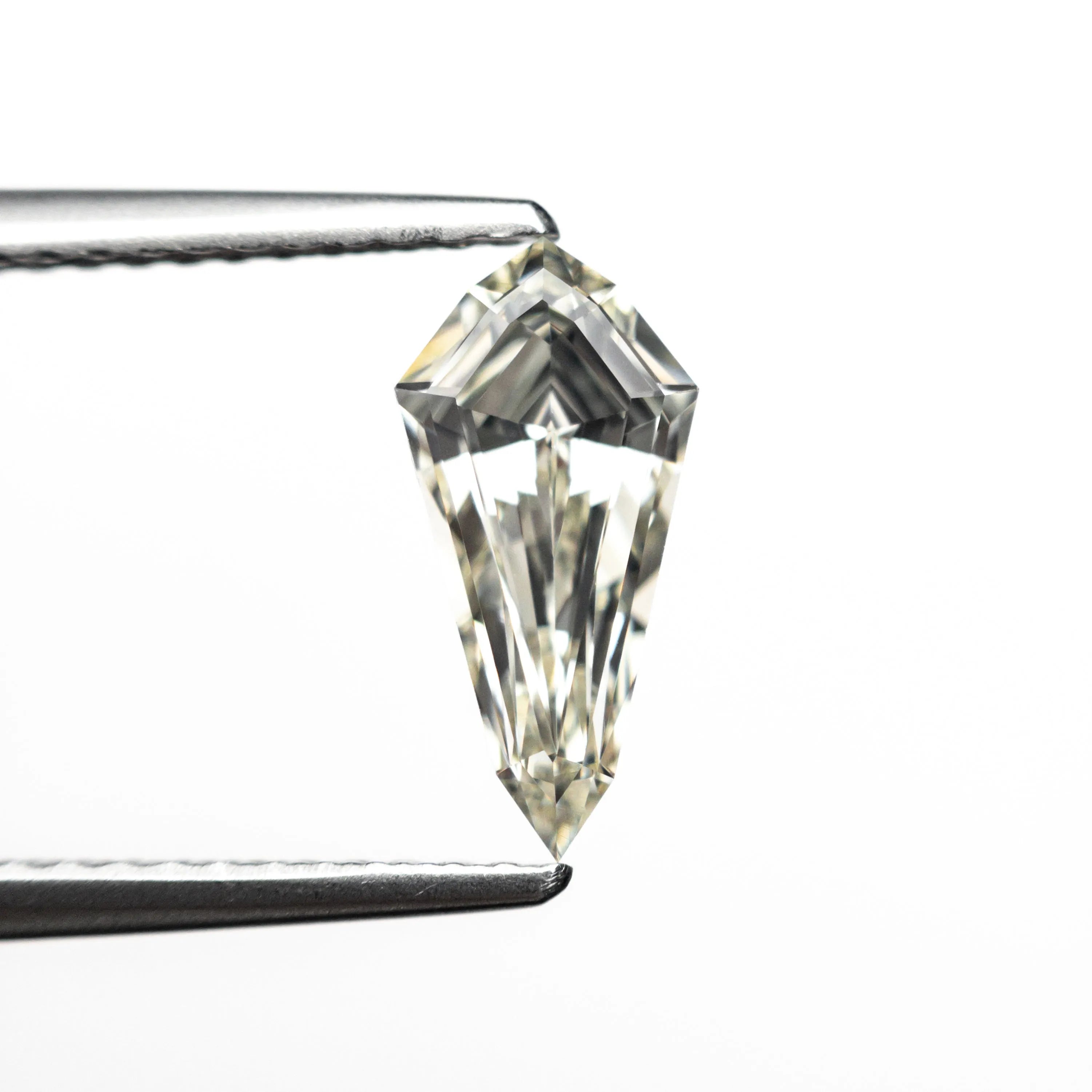 1.05ct 10.63x5.20x3.32mm VS1 M-N Shield Step Cut 25956-01