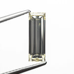 1.52ct 12.21x4.16x2.86mm VS2 O-P Baguette Step Cut 26124-01