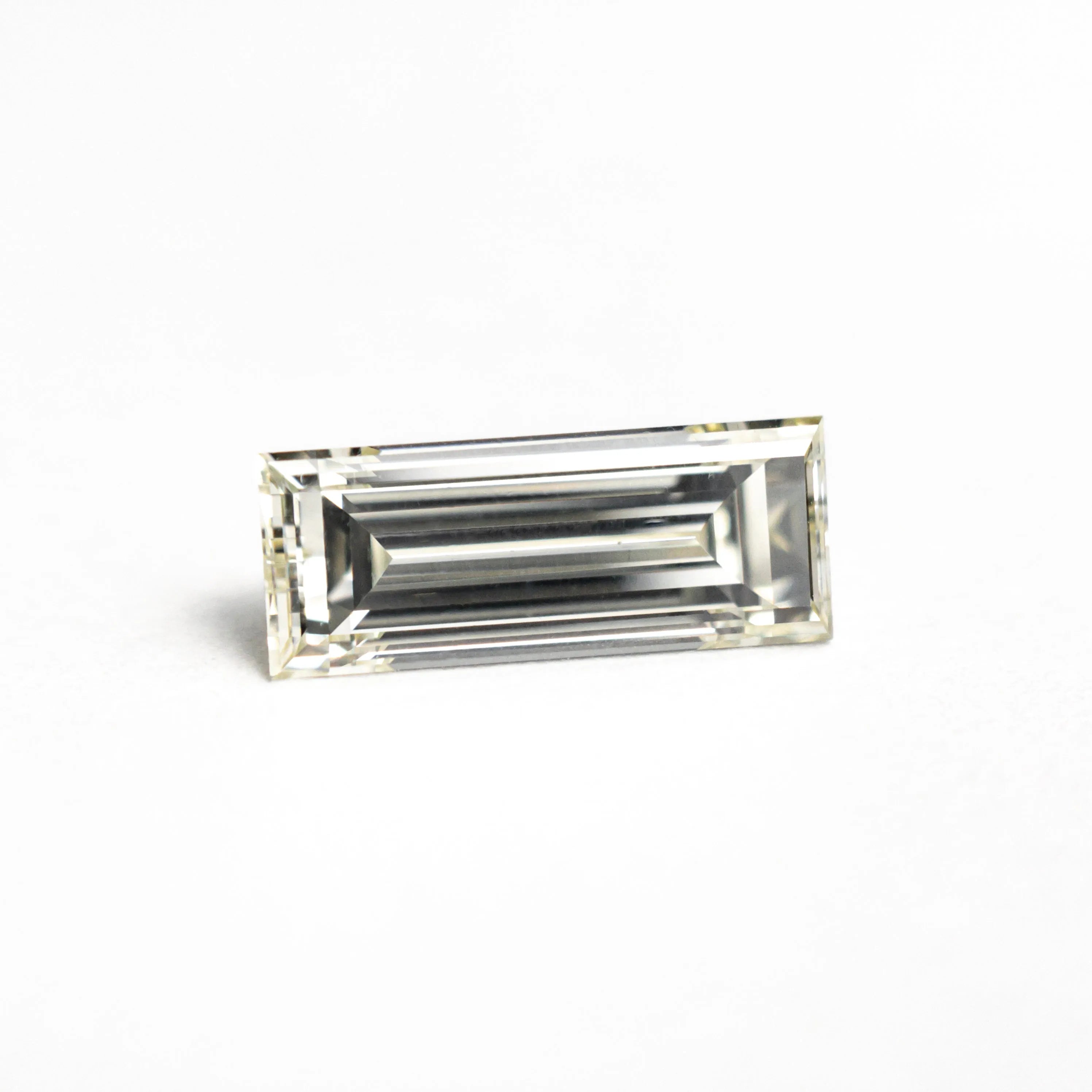1.11ct 9.55x3.80x2.97mm VS2 O-P Baguette Step Cut 26124-02