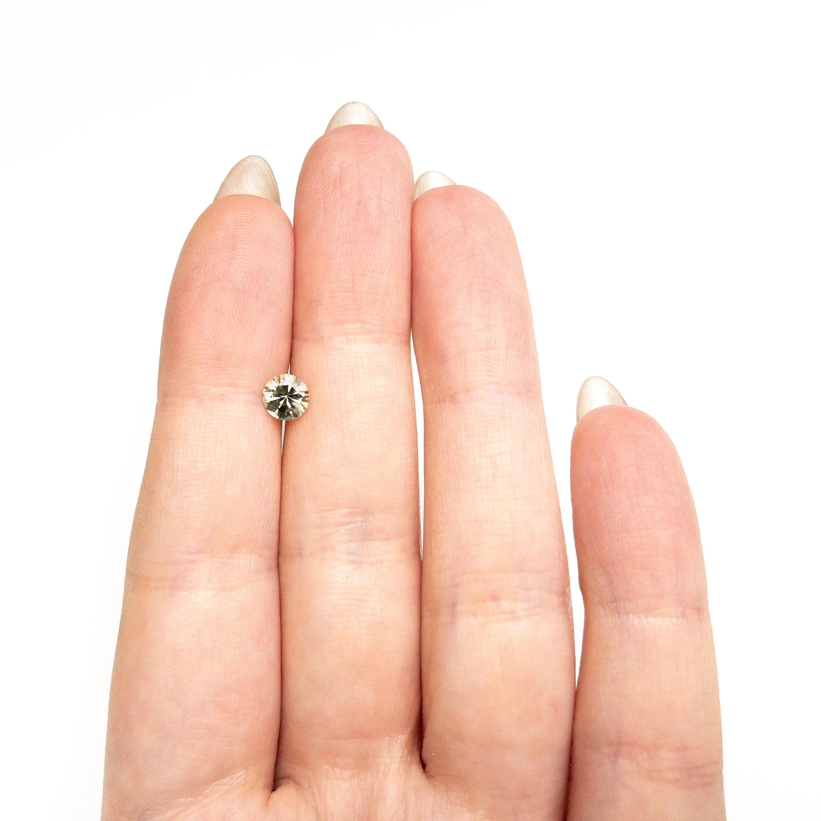 0.76ct 5.56x5.52x3.52mm Round Brilliant Sapphire 26134-16