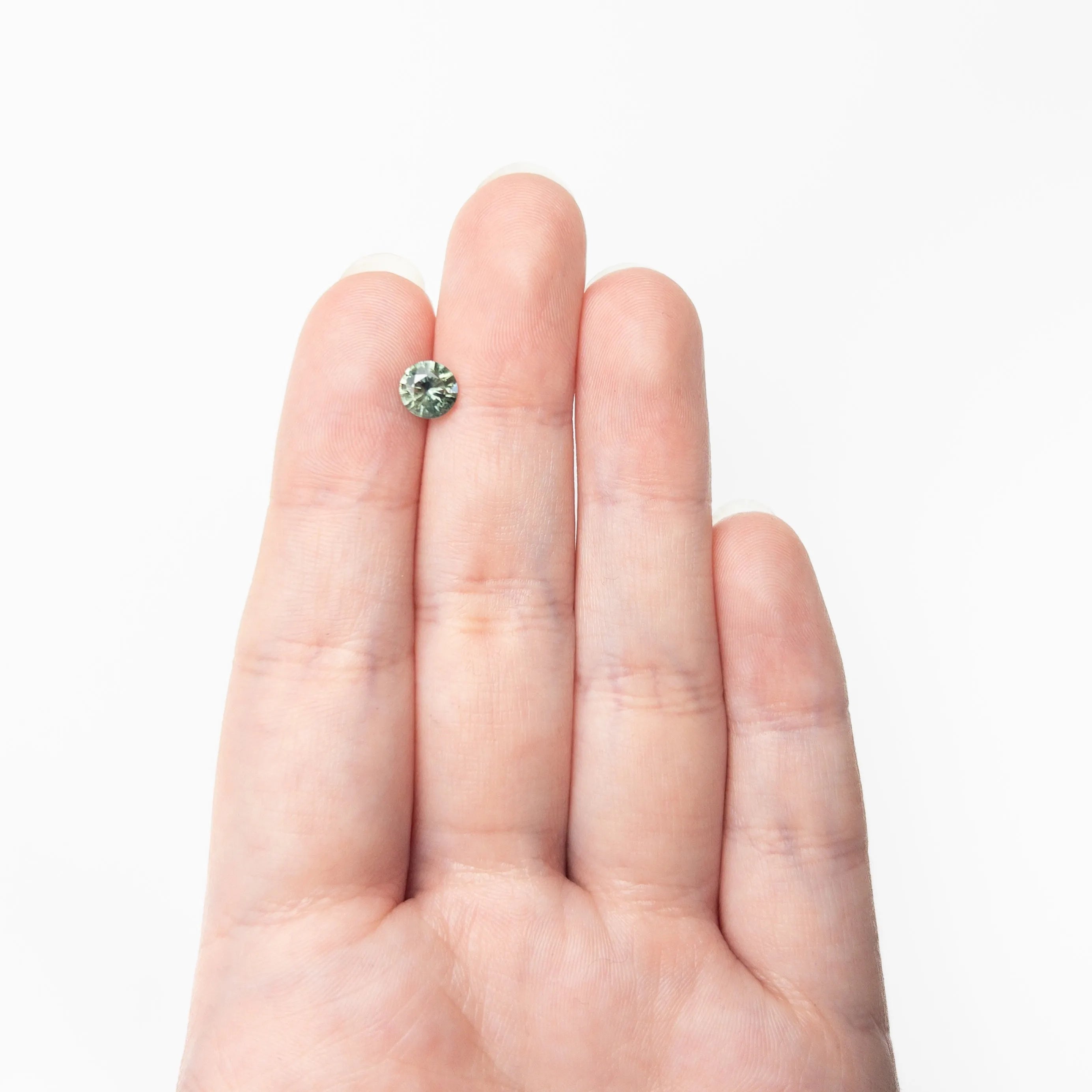 0.98ct 6.06x6.04x3.75mm Round Brilliant Sapphire 26141-22