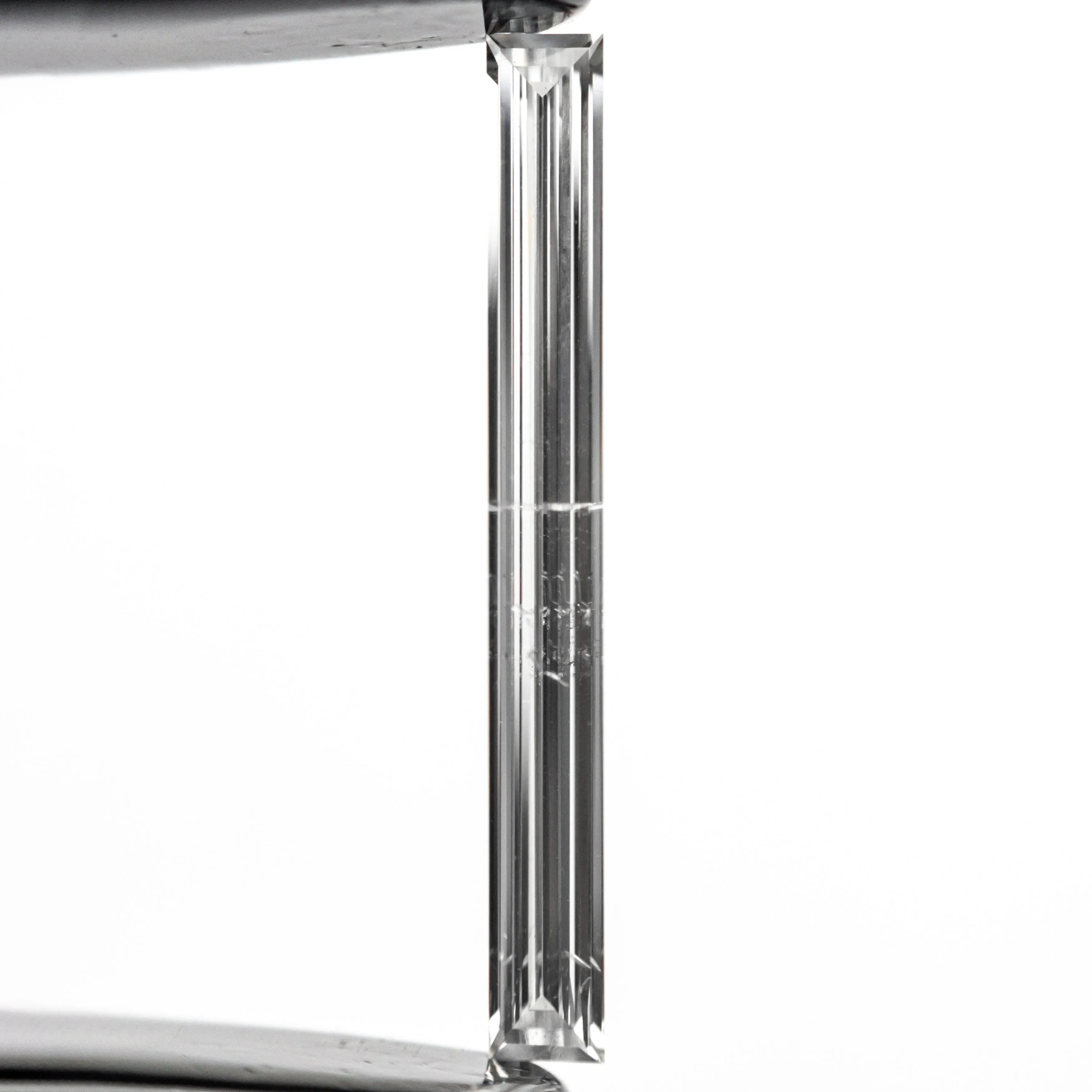 0.52ct 19.44x2.17x1.09mm SI2 E Baguette Step Cut 26545-01