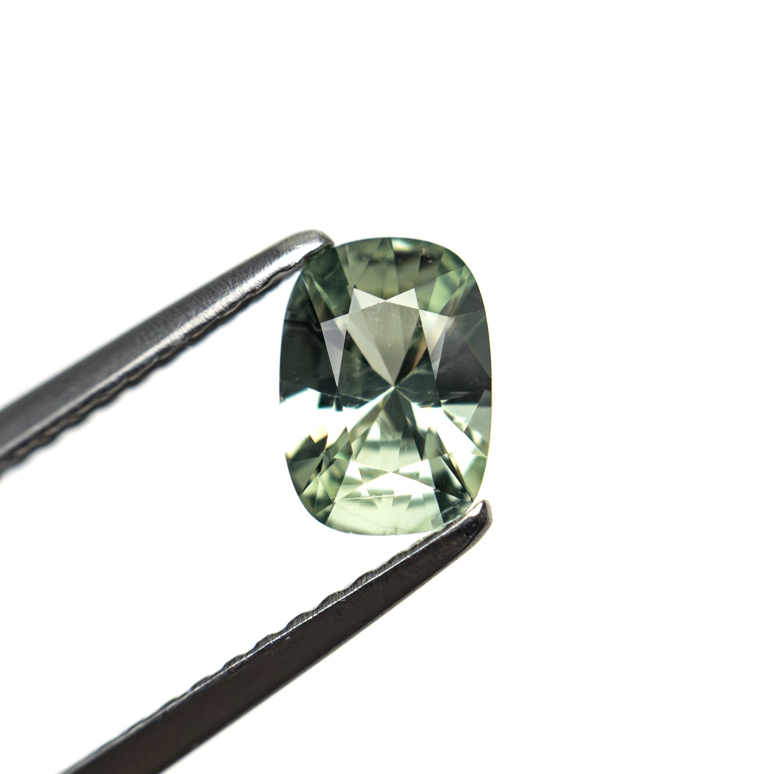 0.64ct 6.23x4.38x2.96mm Cushion Brilliant Sapphire 26765-03