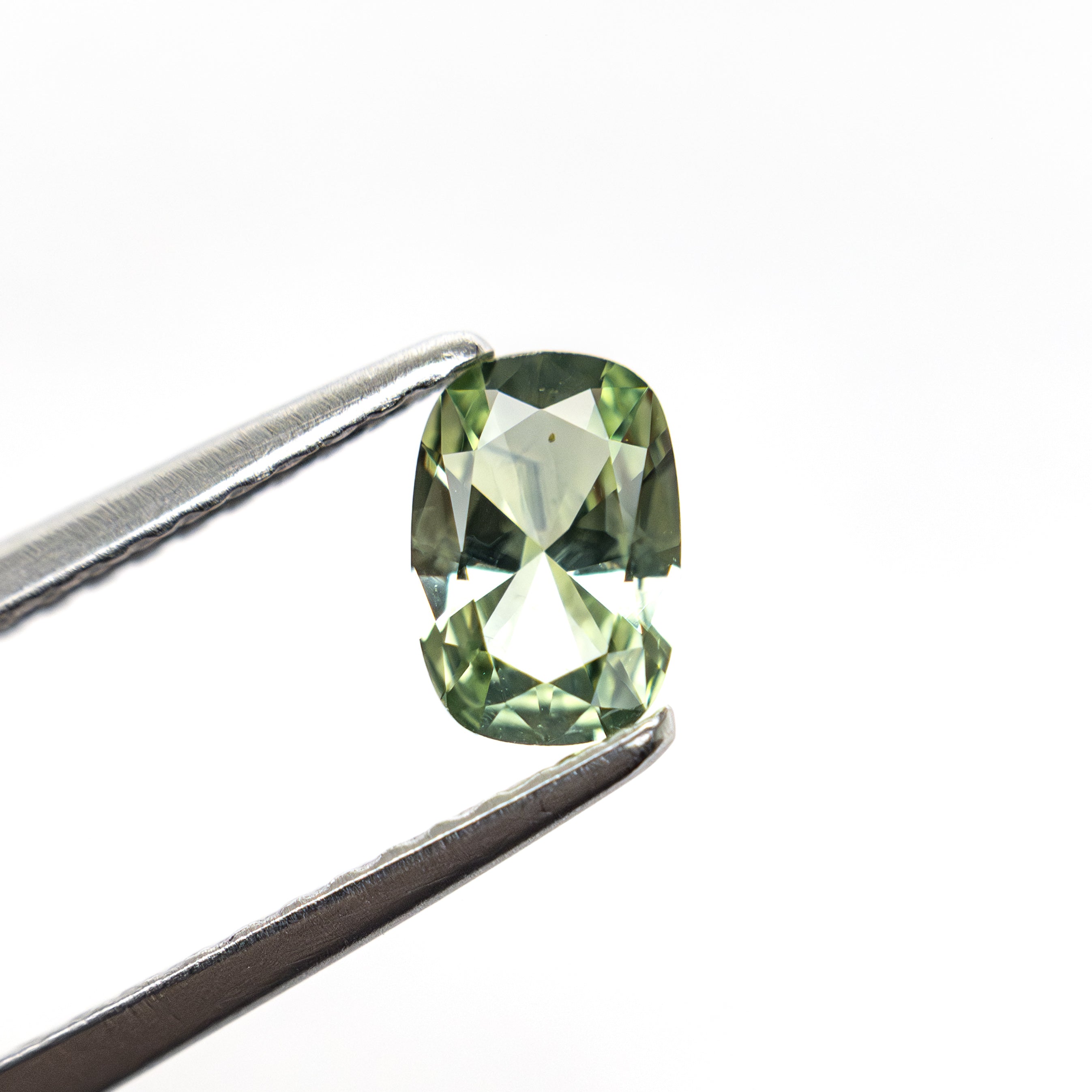 0.47ct 5.52x3.79x2.33mm Cushion Brilliant Sapphire 26765-05