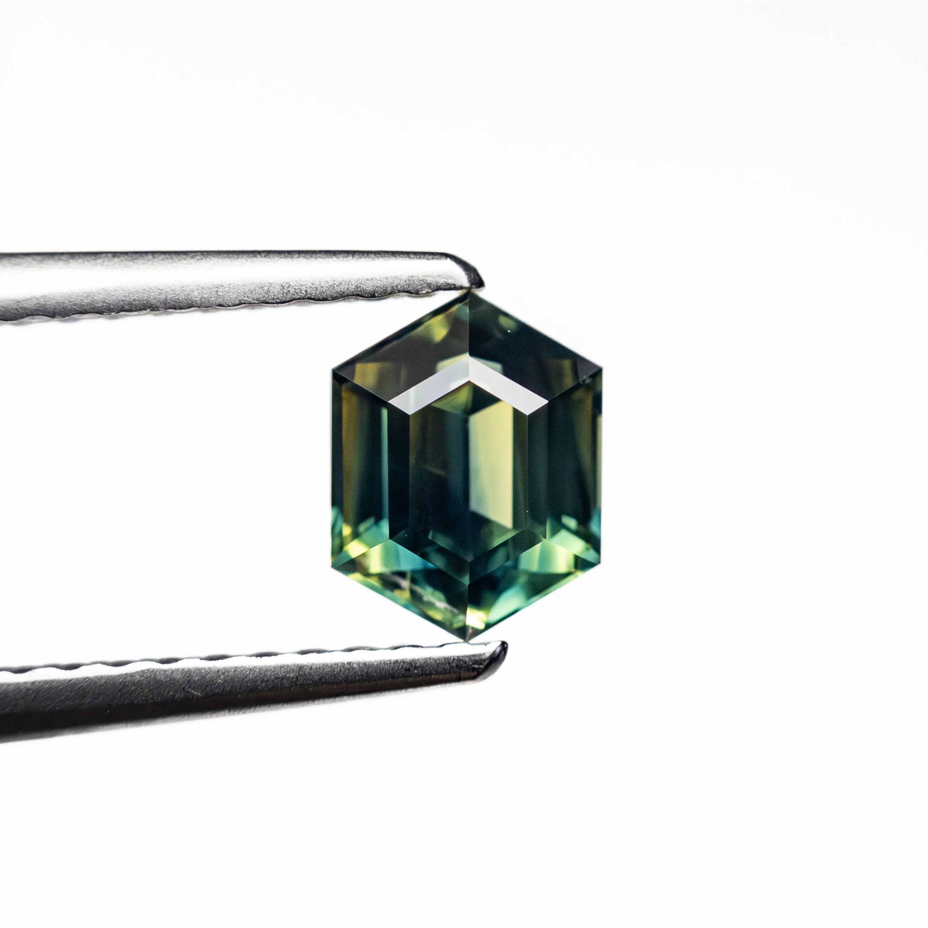 0.97ct 6.36x4.91x3.67mm Hexagon Step Cut Sapphire 27153-01