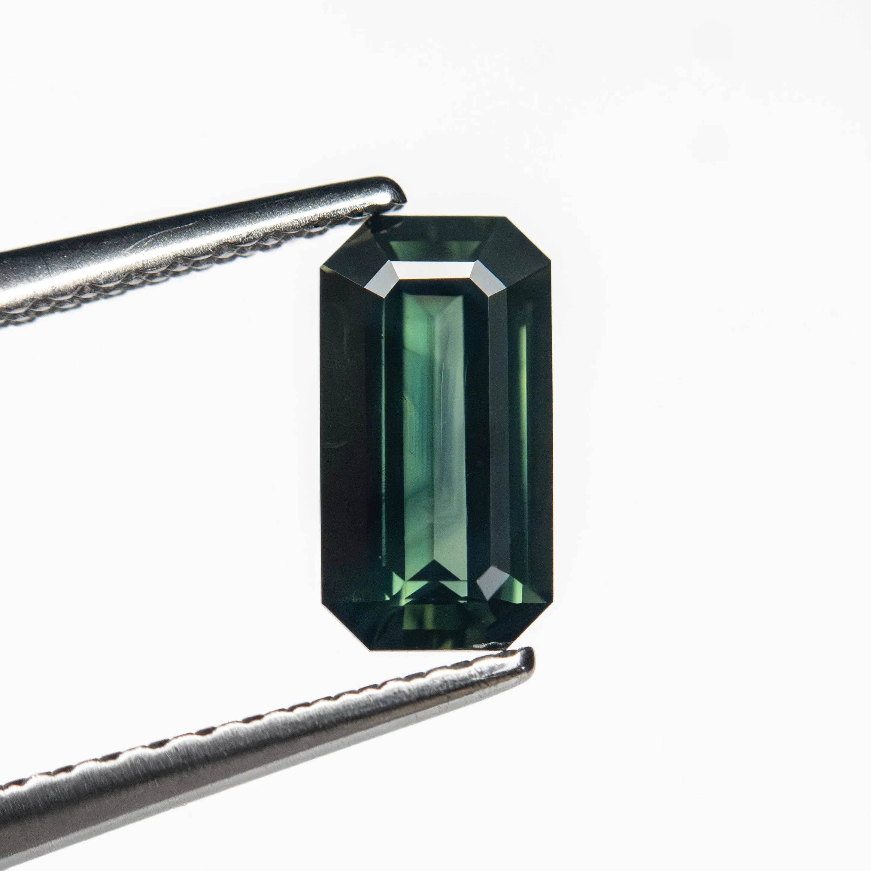 0.99ct 7.89x4.20x2.78mm Cut Corner Rectangle Step Cut Sapphire 27329-05