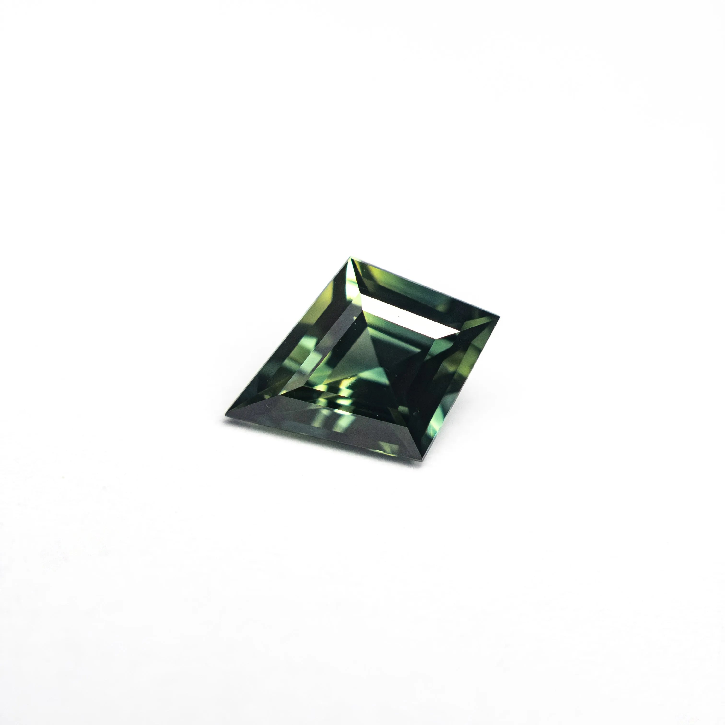 0.66ct 7.66x4.86x3.08mm Kite Step Cut Sapphire 27336-24