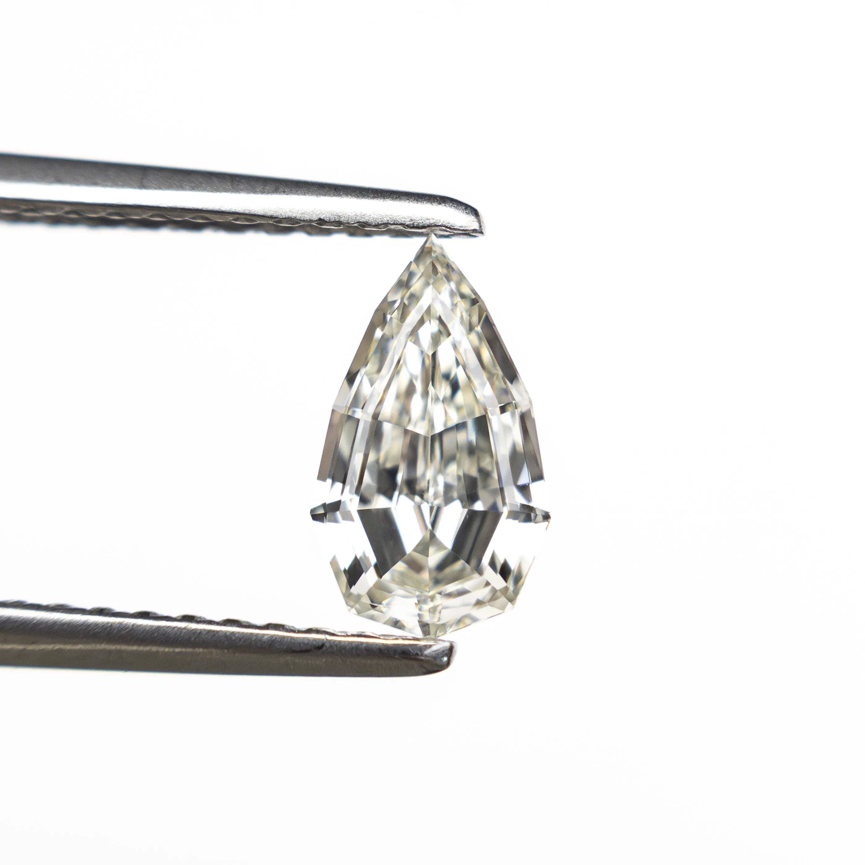 0.78ct 8.13x4.71x3.04mm VS1 L Geo Pear Step Cut 🇿🇦 27364-14