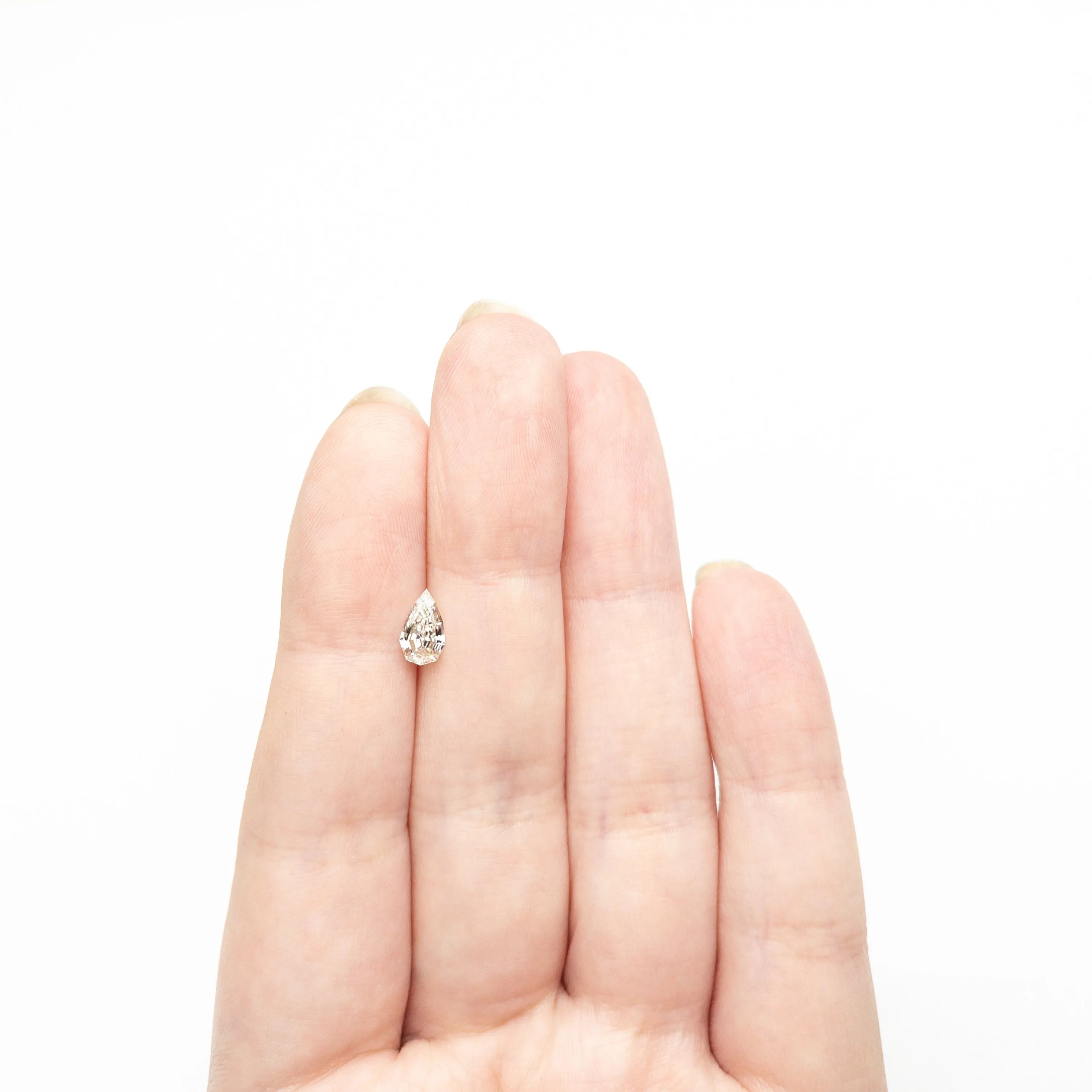 0.78ct 8.13x4.71x3.04mm VS1 L Geo Pear Step Cut 🇿🇦 27364-14