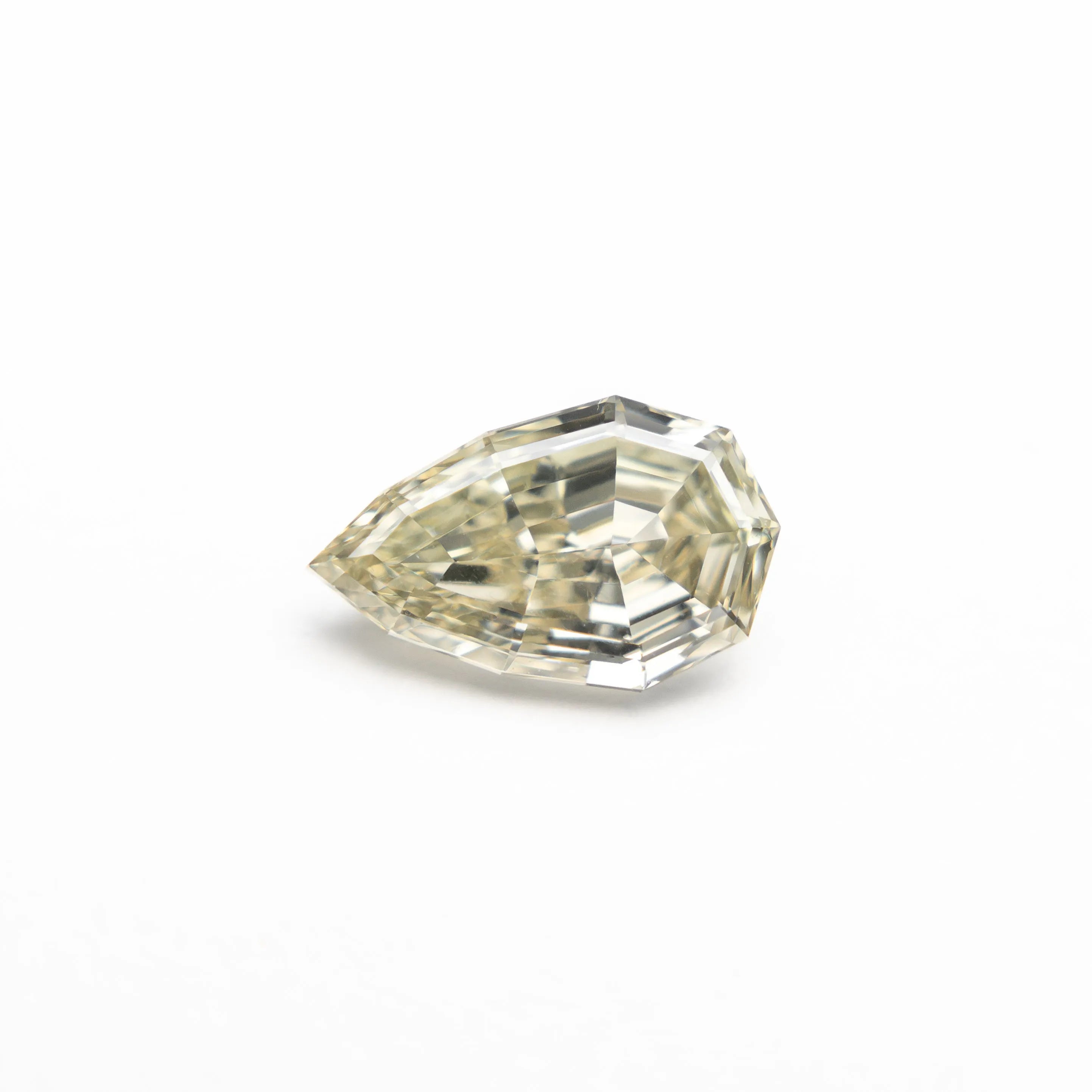 0.66ct 7.69x4.80x2.65mm VS1 C4 Geo Pear Step Cut 🇿🇦 27364-16