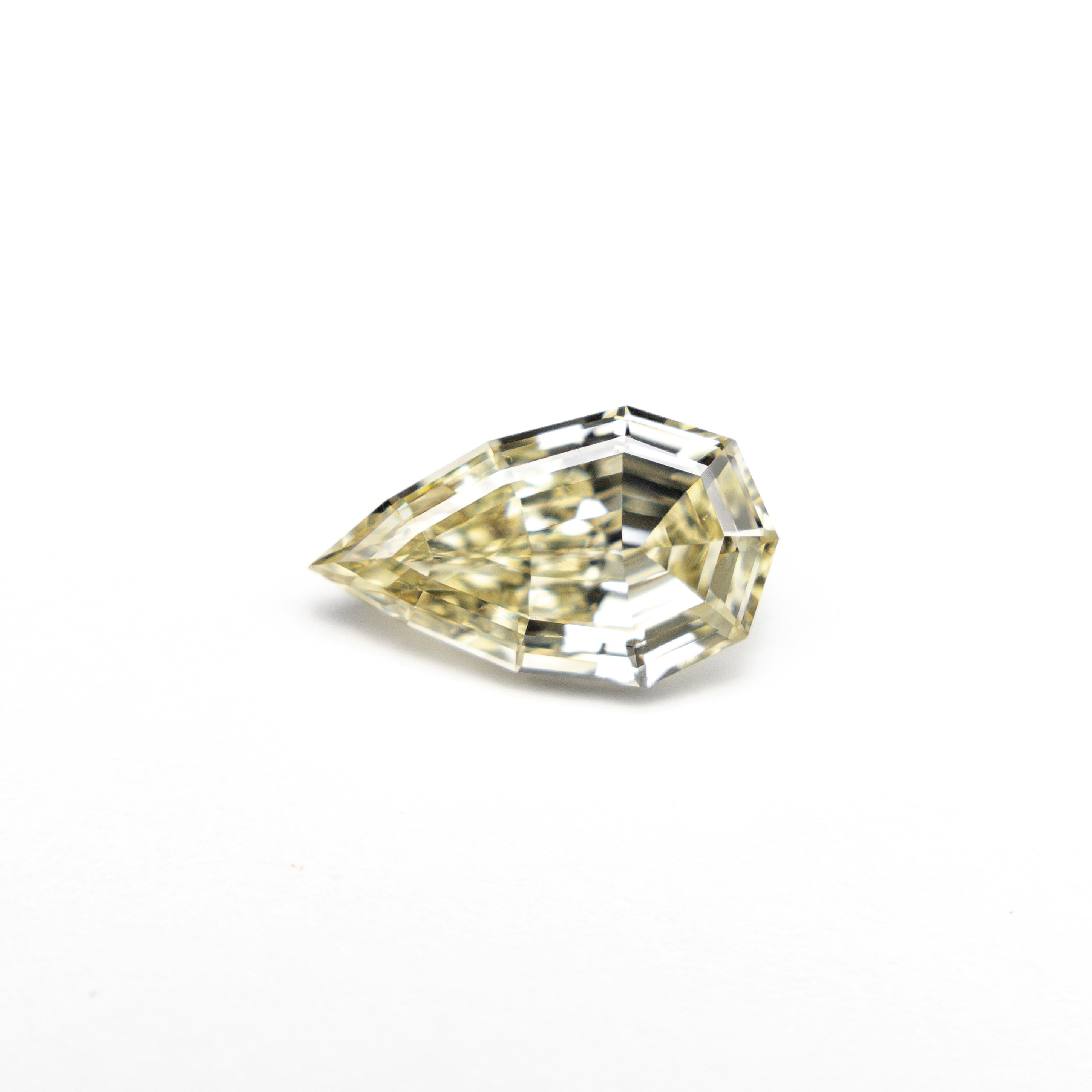 0.63ct 7.73x4.57x2.65mm VS2 C4 Geo Pear Step Cut 🇿🇦 27364-21