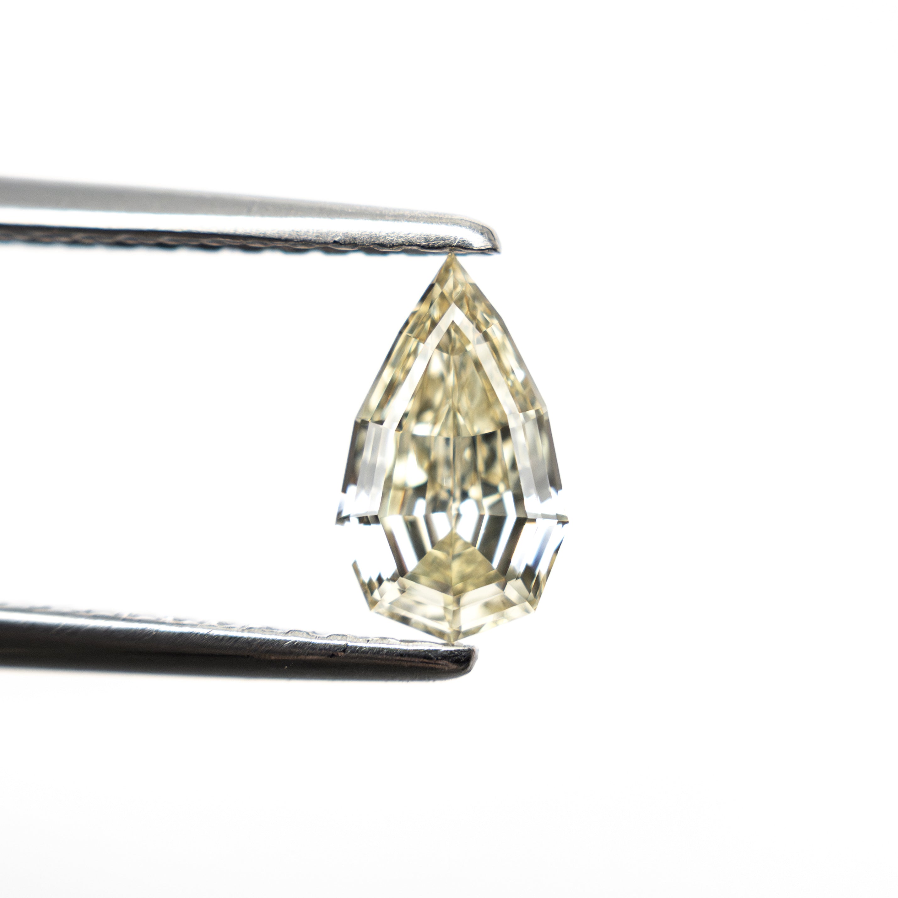 0.63ct 7.73x4.57x2.65mm VS2 C4 Geo Pear Step Cut 🇿🇦 27364-21