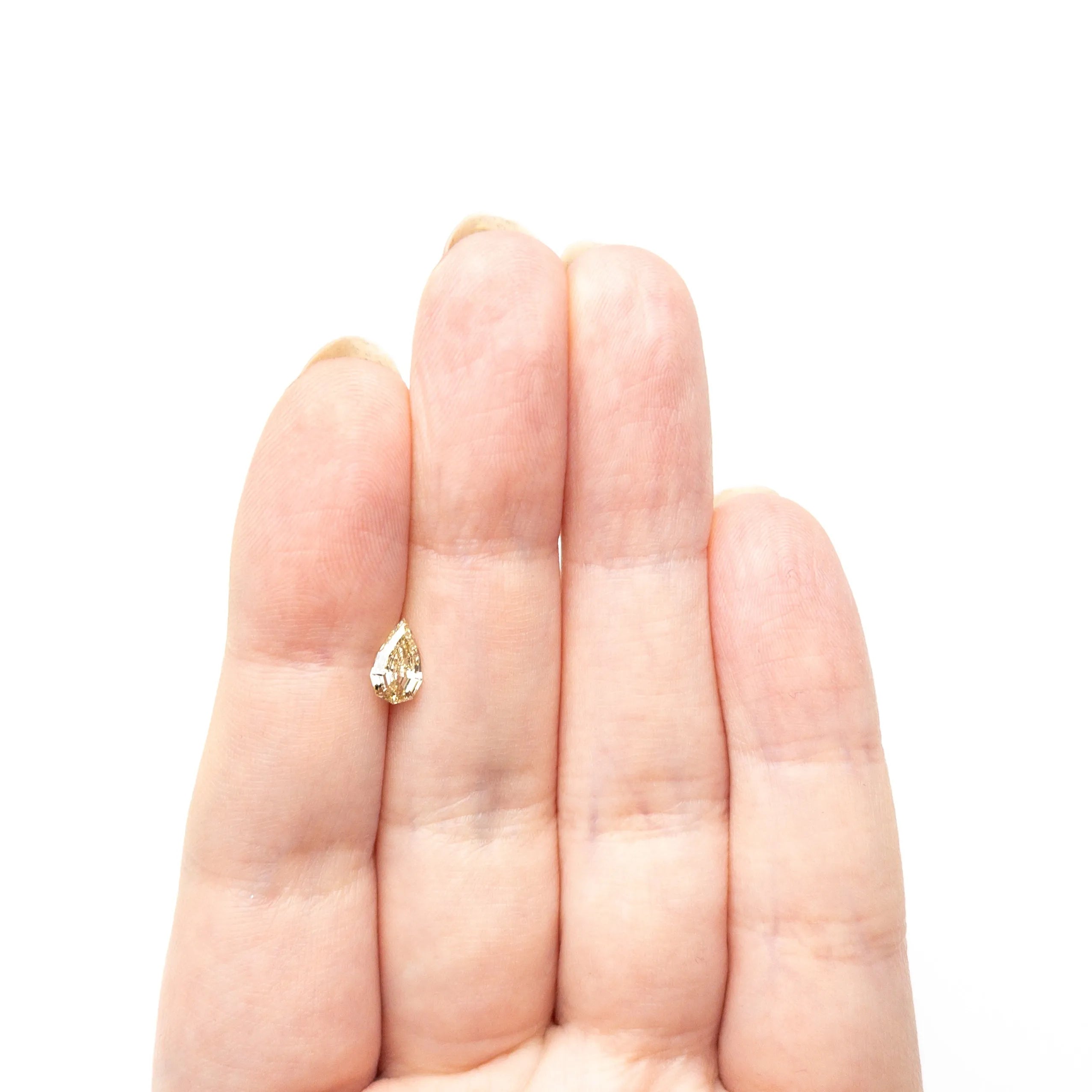 0.63ct 7.73x4.57x2.65mm VS2 C4 Geo Pear Step Cut 🇿🇦 27364-21