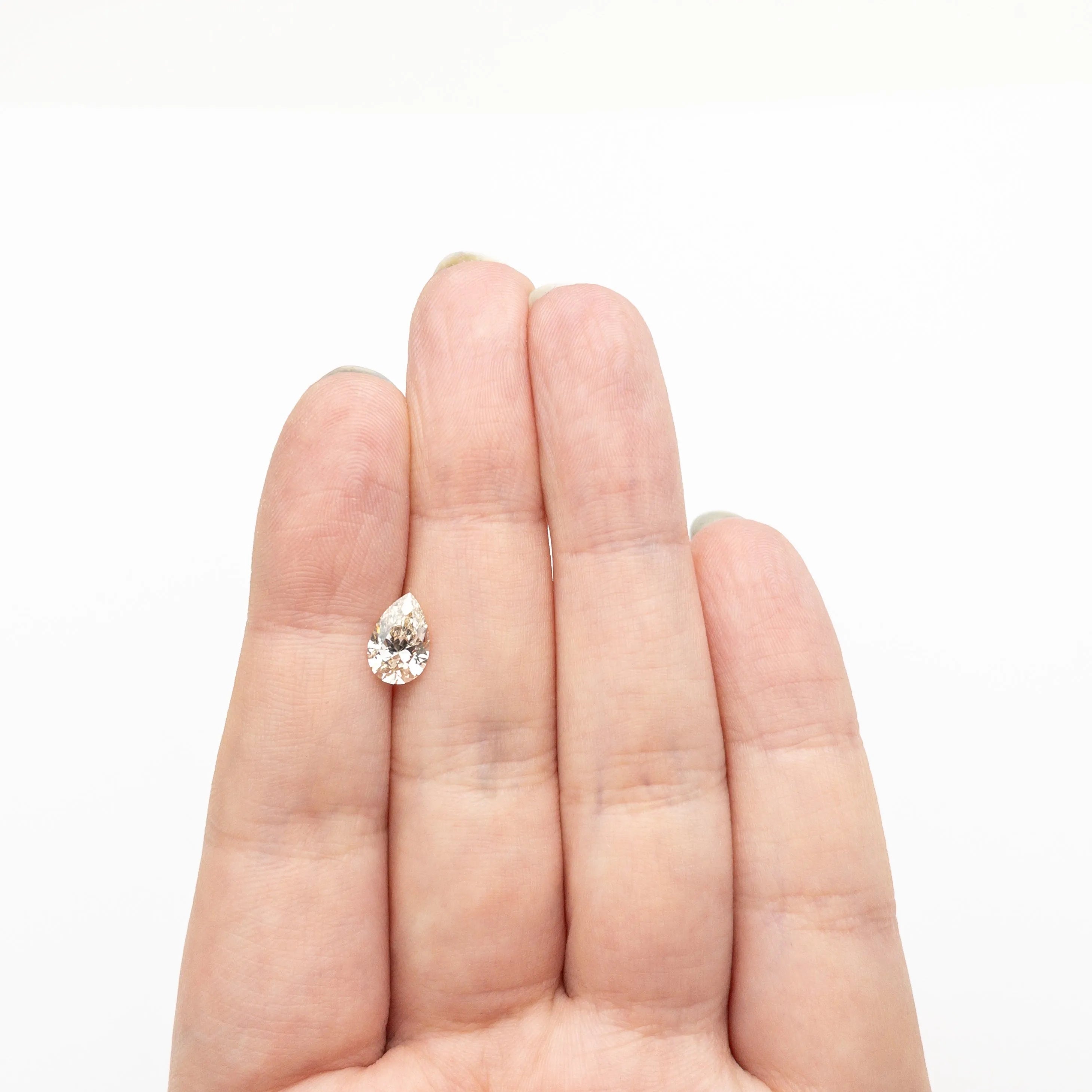 1.20ct 9.20x5.99x3.69mm VS2 O-P Pear Brilliant 27376-05