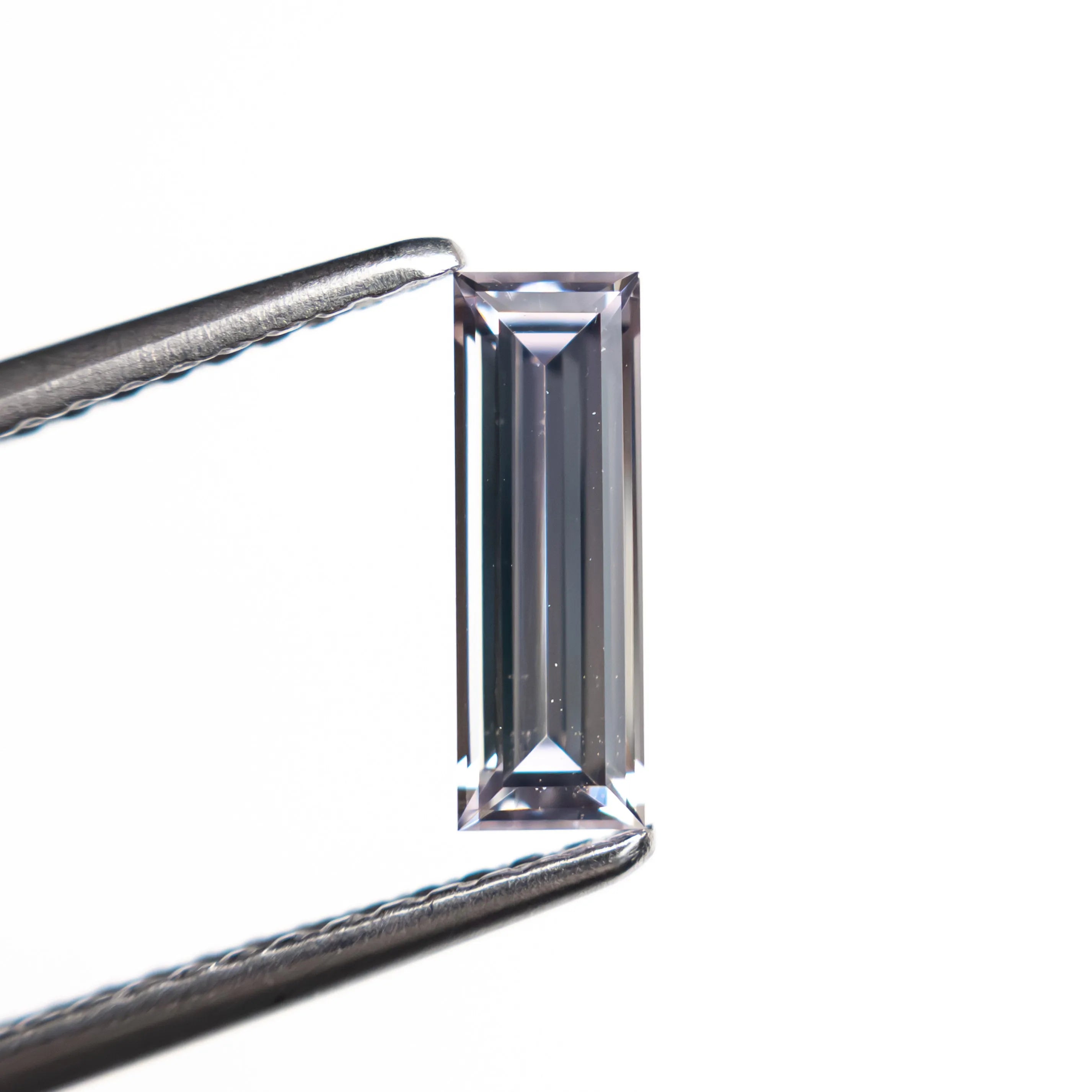 0.63ct 8.99x3.02x2.04mm Baguette Step Cut Sapphire 27720-02
