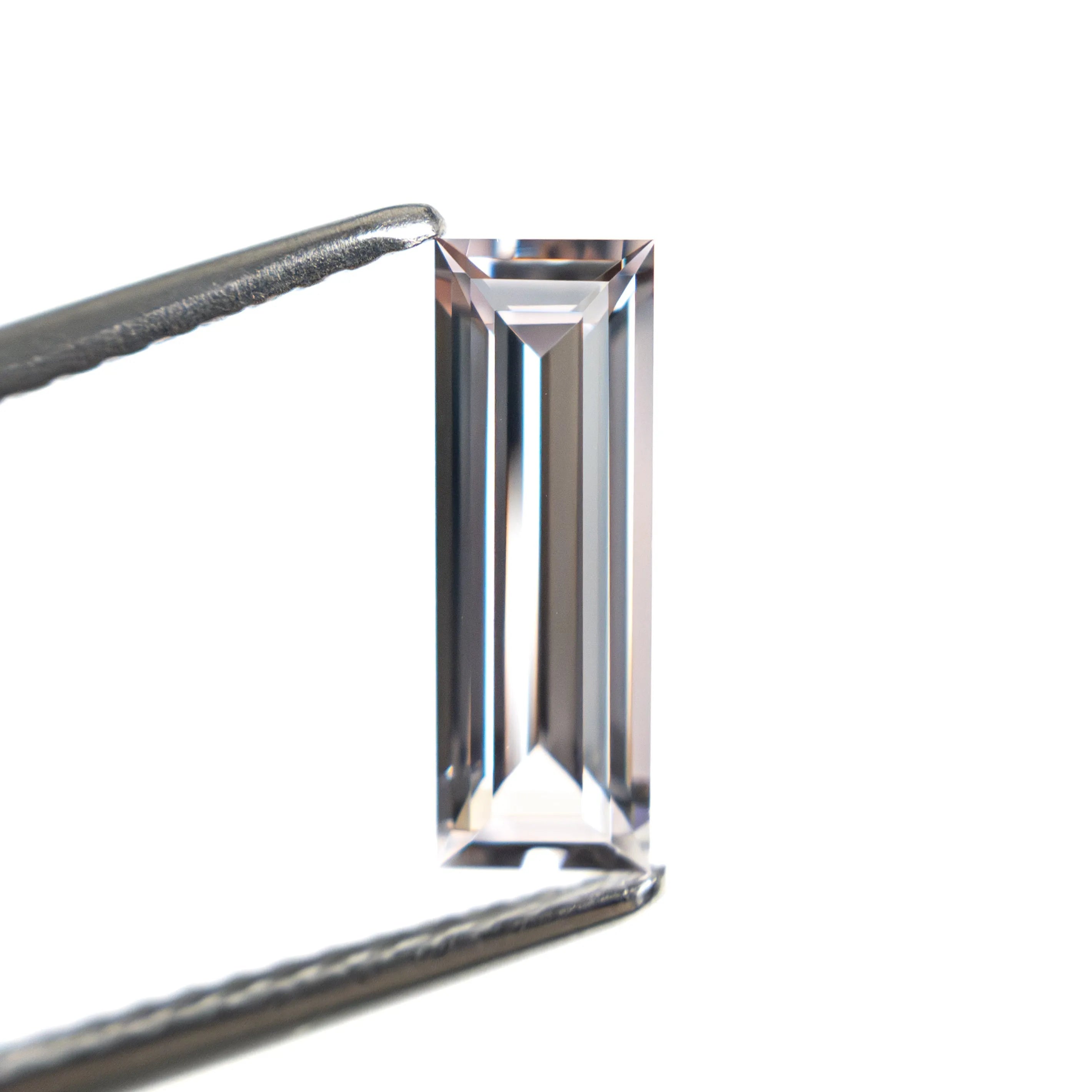 0.91ct 10.30x3.53x2.27mm Baguette Step Cut Sapphire 27720-06