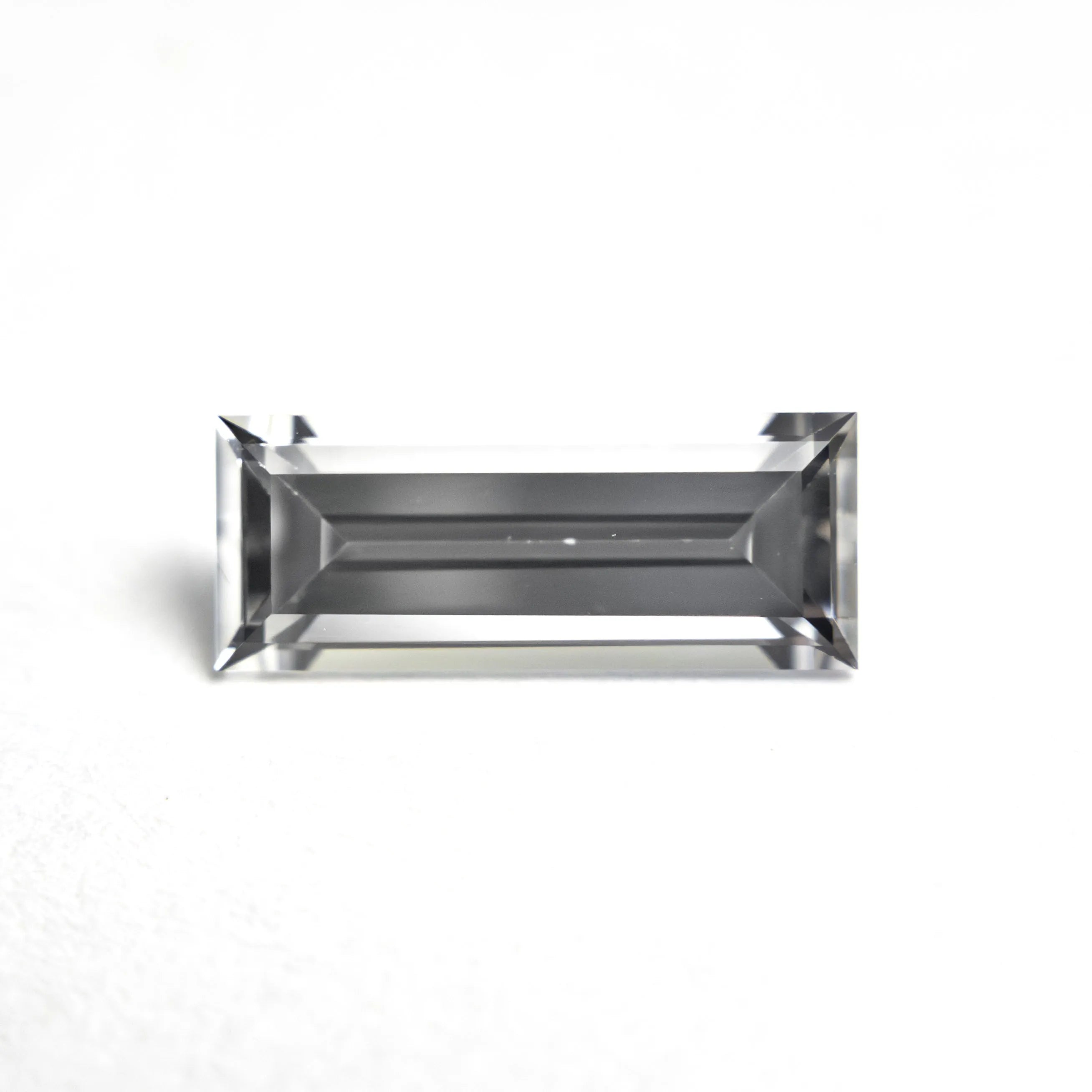 1.06ct 9.53x3.81x2.64mm Baguette Step Cut Sapphire 27720-07