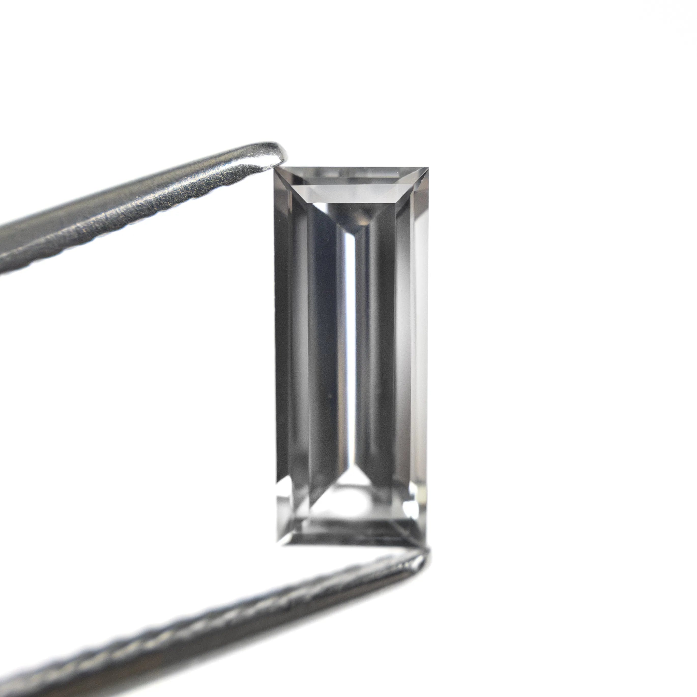 1.06ct 9.53x3.81x2.64mm Baguette Step Cut Sapphire 27720-07