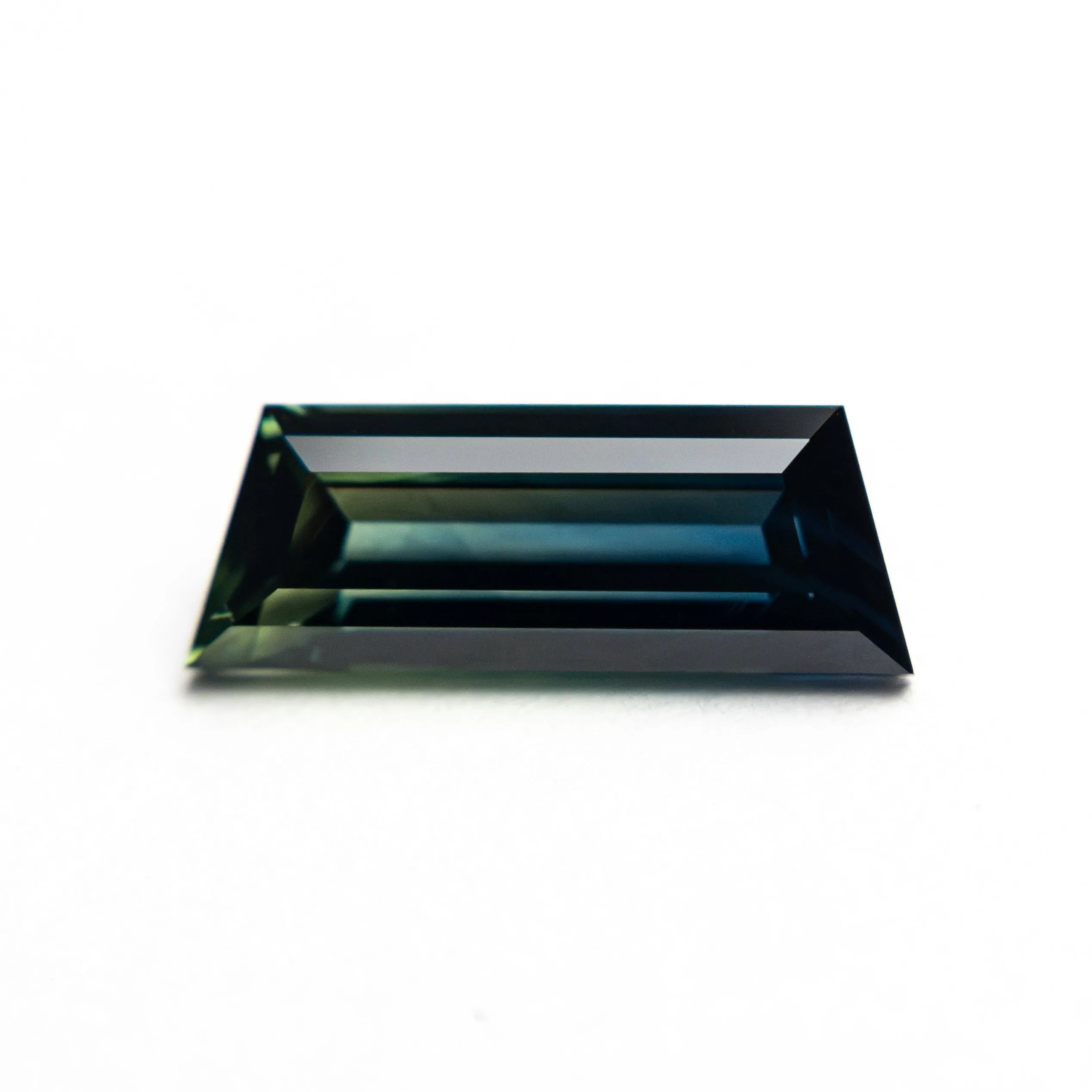 1.31ct 10.46x3.86x2.76mm Trapezoid Step Cut Sapphire 27766-11