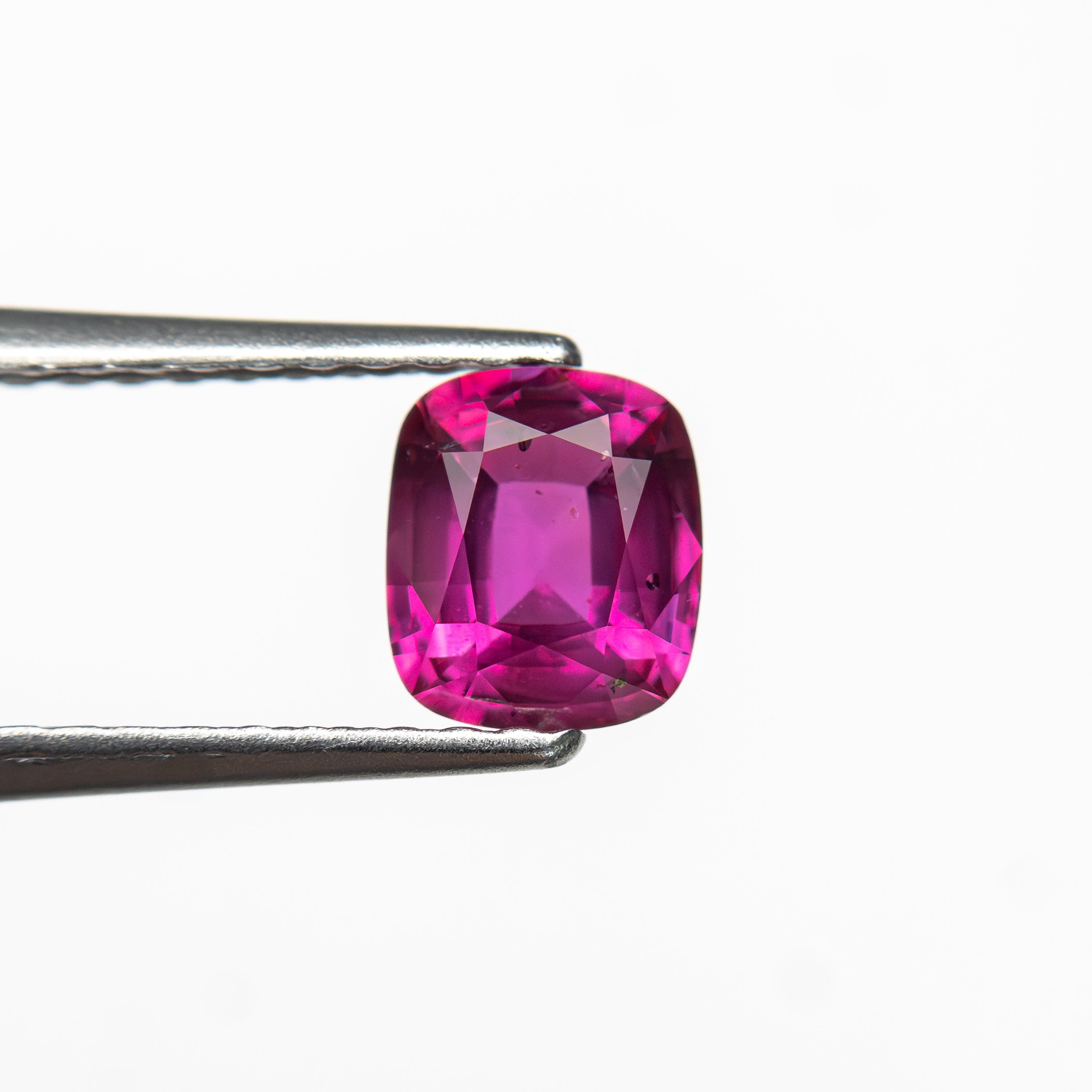 0.63ct 5.43x4.68x2.77mm Cushion Brilliant Sapphire 27956-18