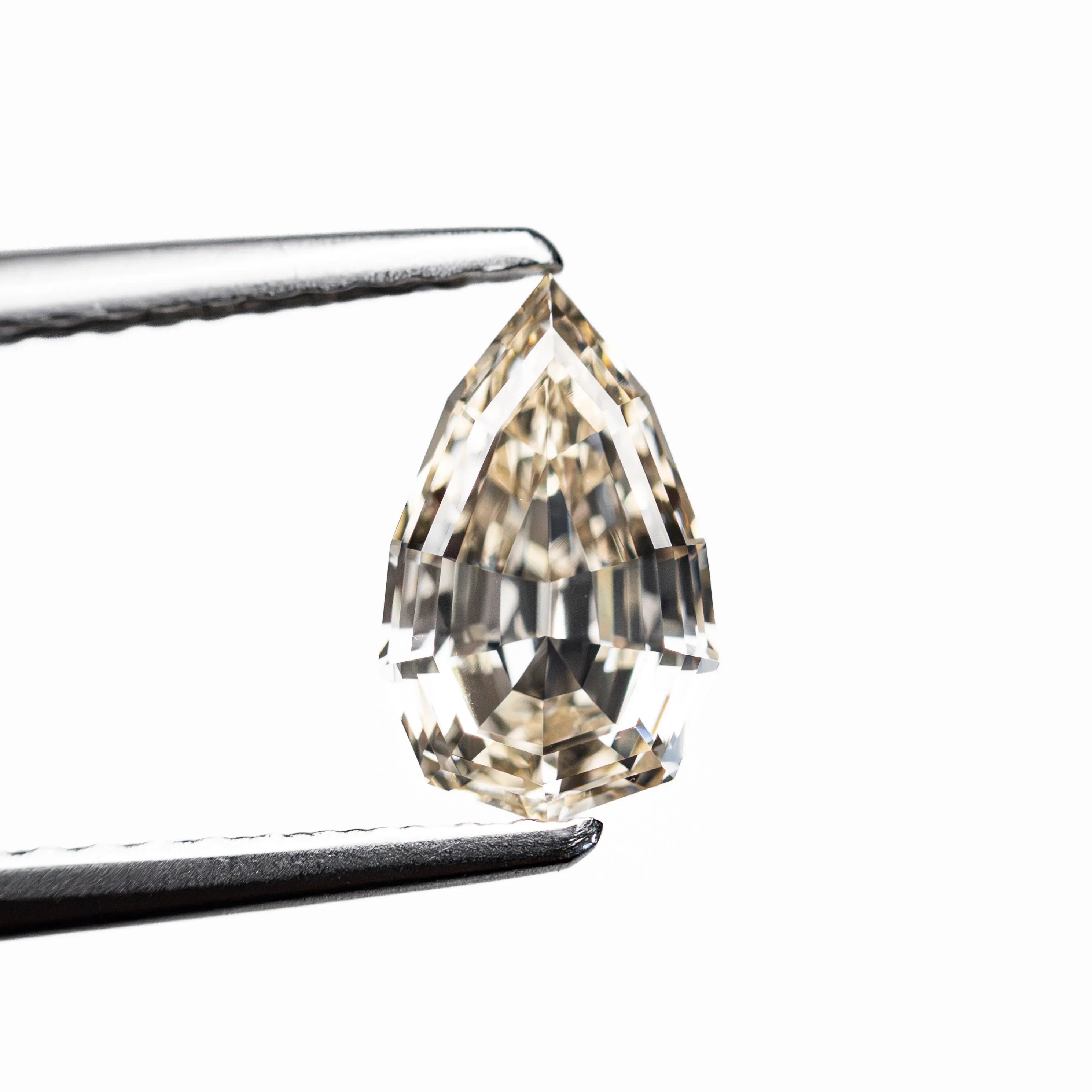 1.06ct 8.52x5.22x3.28mm VVS2 W-X Geo Pear Step Cut 28054-01