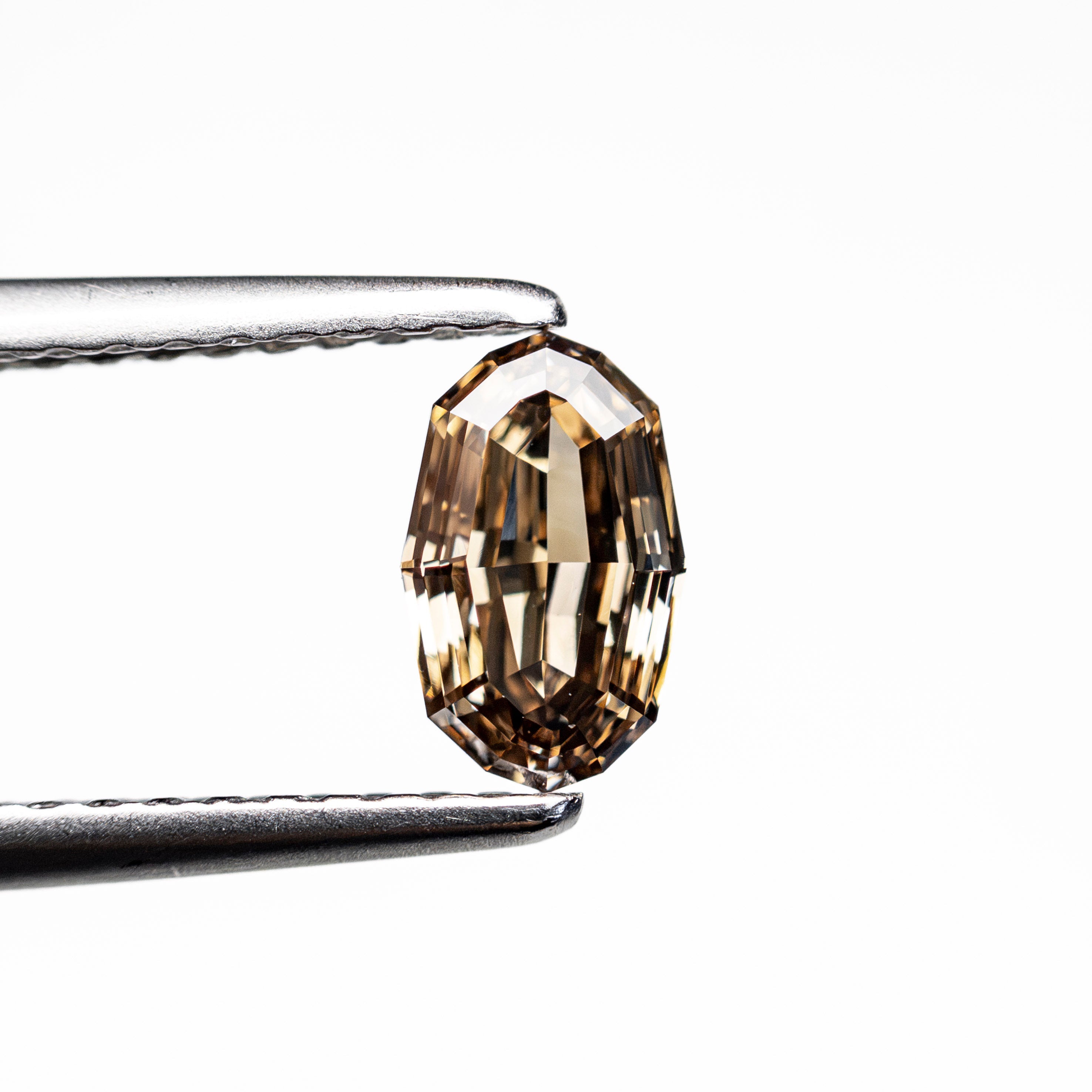 0.61ct 6.77x4.18x2.64mm Geo Oval Step Cut 🇿🇦 28060-01