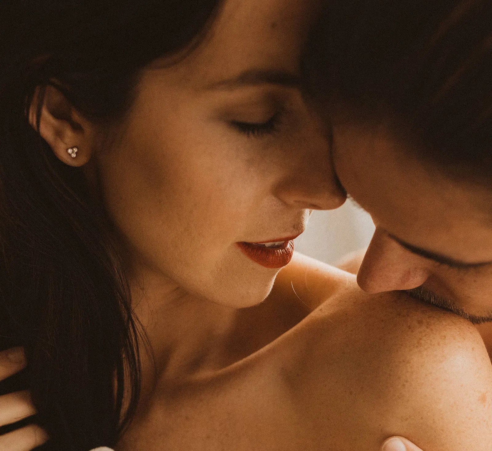 Petite 3-Stone Diamond Earrings On Ear