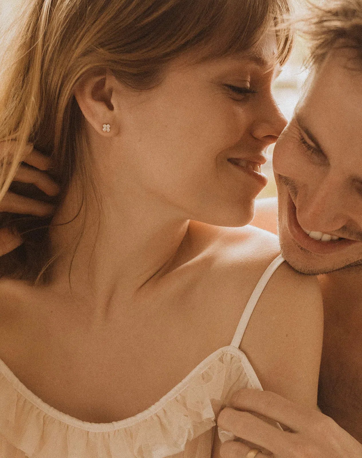 Petite 4-Stone Lab-Grown Diamond Stud Earrings on Ear