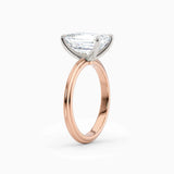 Abby | Emerald Solitaire Tapered Band Engagement Ring