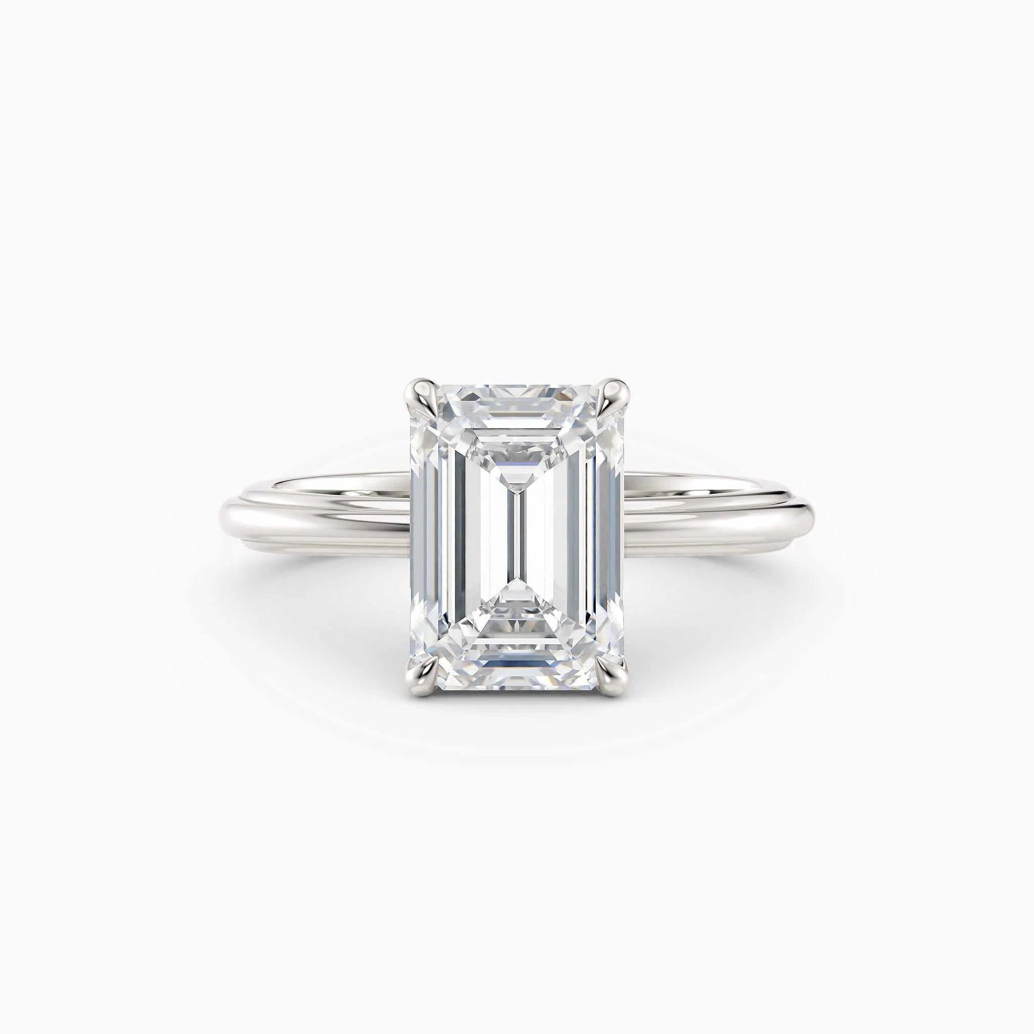 Abby | Emerald Solitaire Tapered Band Engagement Ring