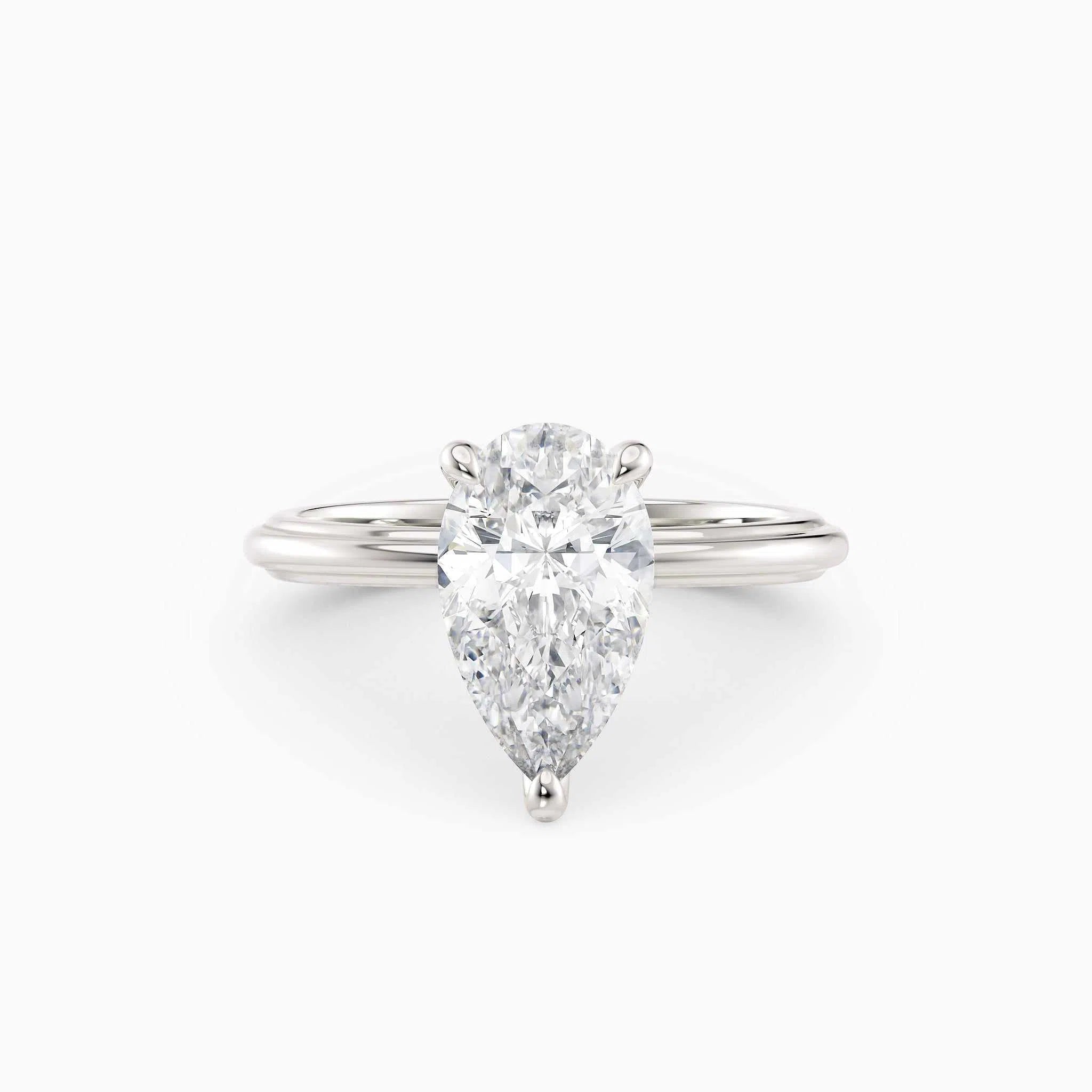 Abby | Pear Solitaire Tapered Band Engagement Ring