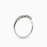 Curved, contoured round diamond wedding band