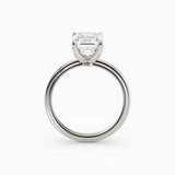 Abby | Emerald Solitaire Tapered Band Engagement Ring