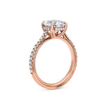 Round Cut Pave Cathedral Engagement Ring in Rose Gold