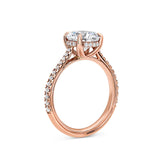 Round Cut Pave Cathedral Engagement Ring in Rose Gold