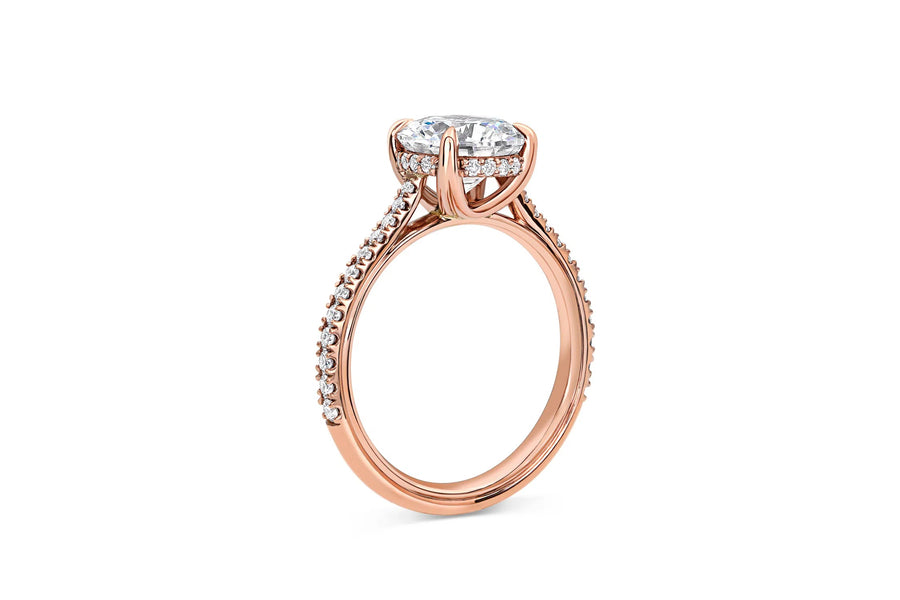 Round Cut Pave Cathedral Engagement Ring in Rose Gold