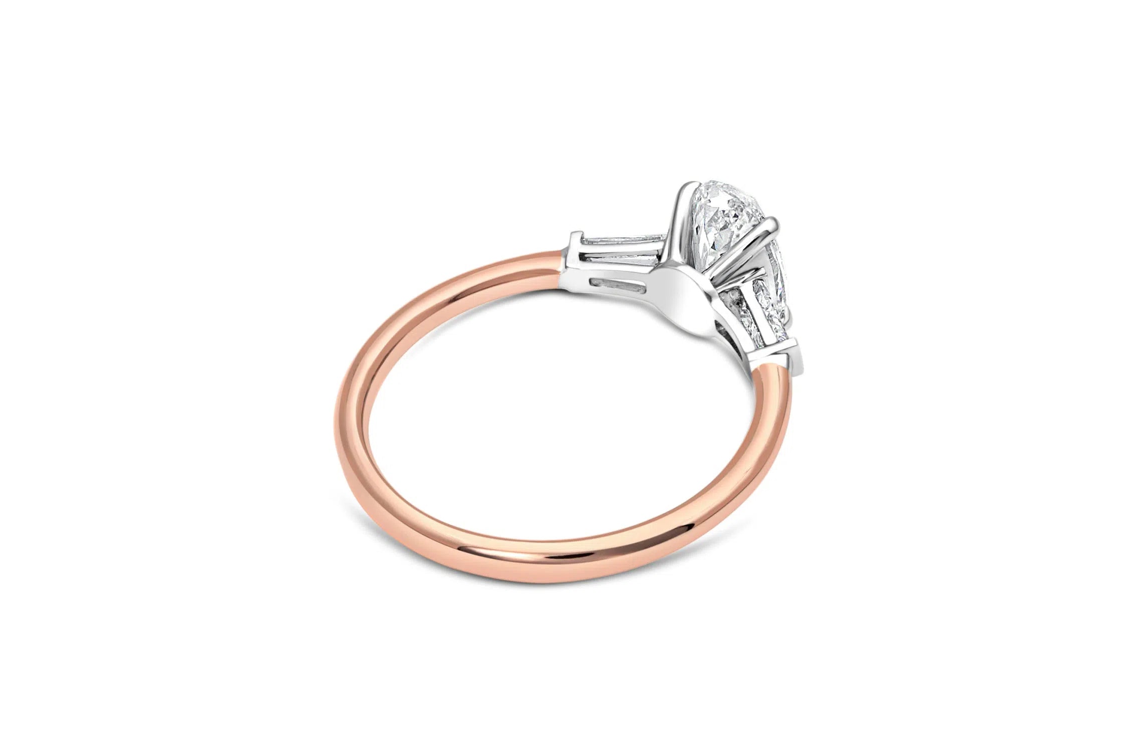 Baguette Three Stone Oval Cut Engagement Ring in Gold