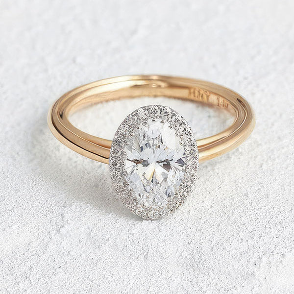 Oval Diamond with Pave Halo in Yellow Gold.jpg__PID:1e54bfb7-b4aa-4725-9e26-5c0c007fd1b5