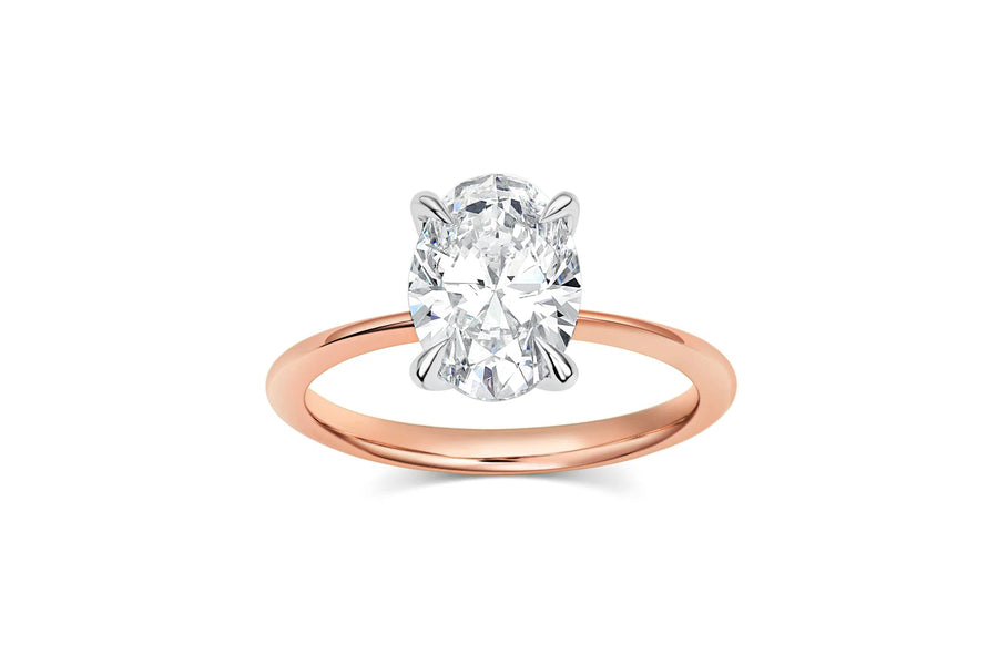 Oval Cut Four Prong Engagement Ring