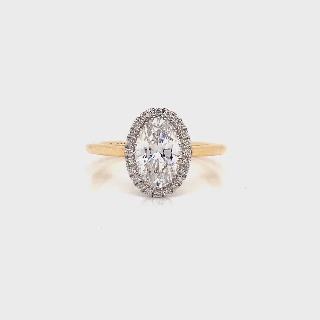Round Halo Cathedral Engagement Ring by Honey Jewelry Co